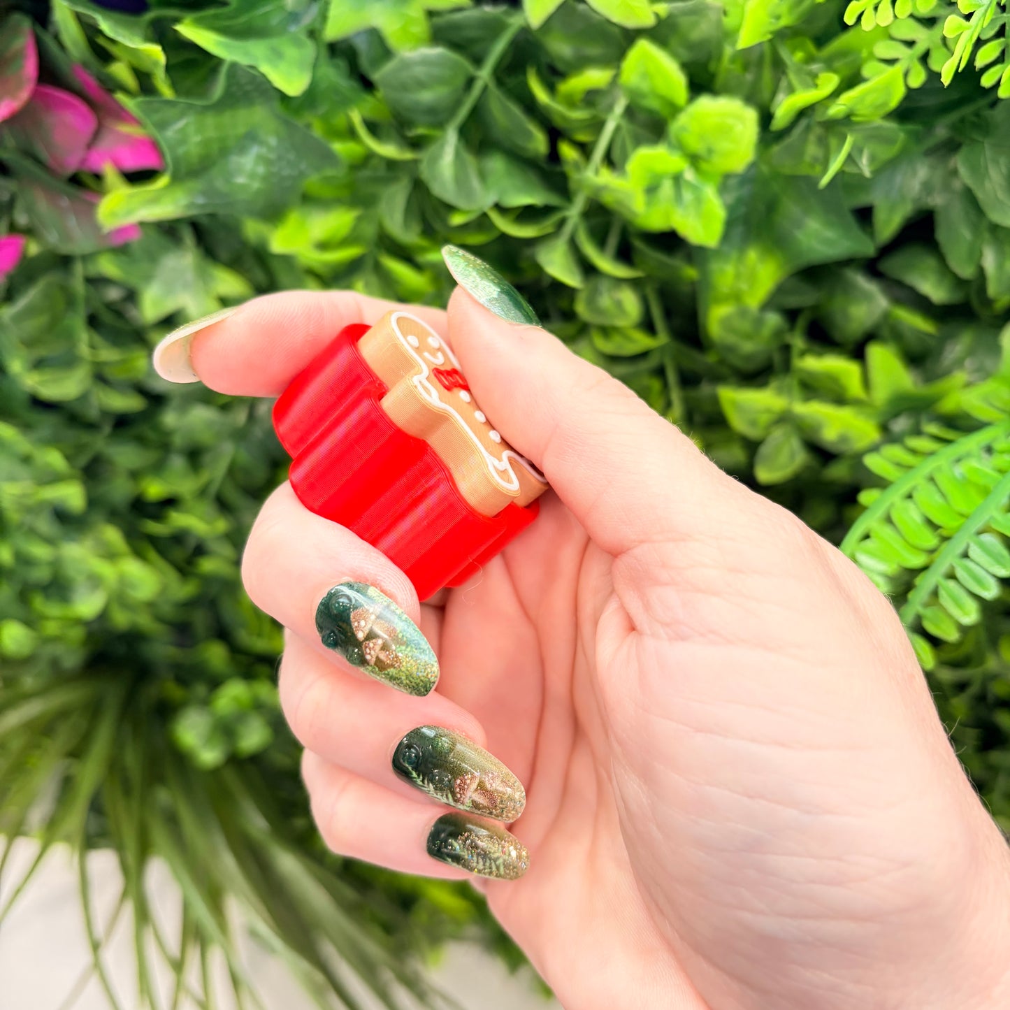 Holiday gingerbread fidget clicker toy.