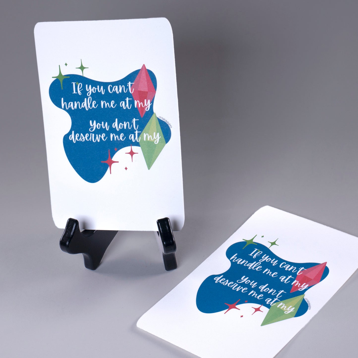 4x6" Sims-inspired print featuring the phrase "If you can't handle me at my... you don't deserve me at my..." with colorful plumbobs. Perfect for Simmers, gaming rooms, and fun gamer decor.