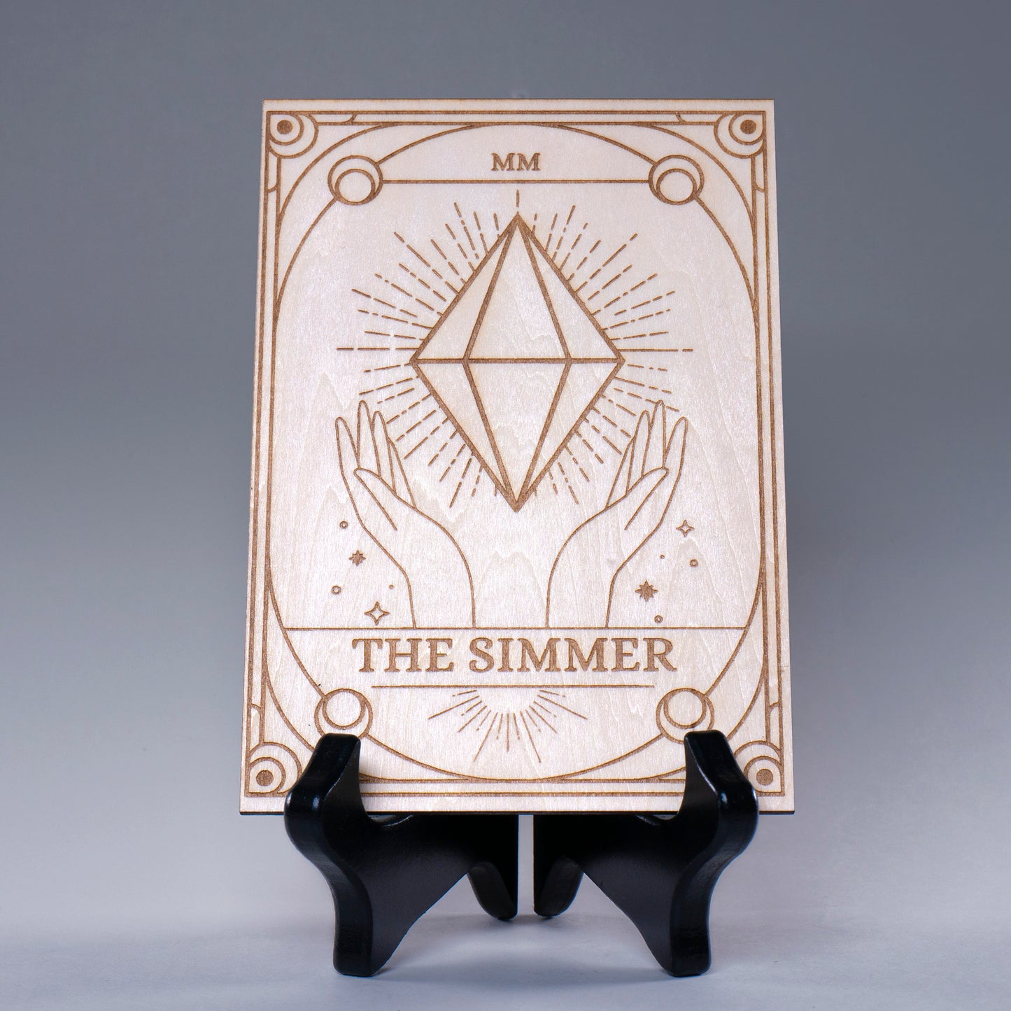 Laser-engraved wooden tarot card featuring "The Simmer" with a radiant plumbob design. A must-have for Sims fans, gamers, and lovers of geeky decor.