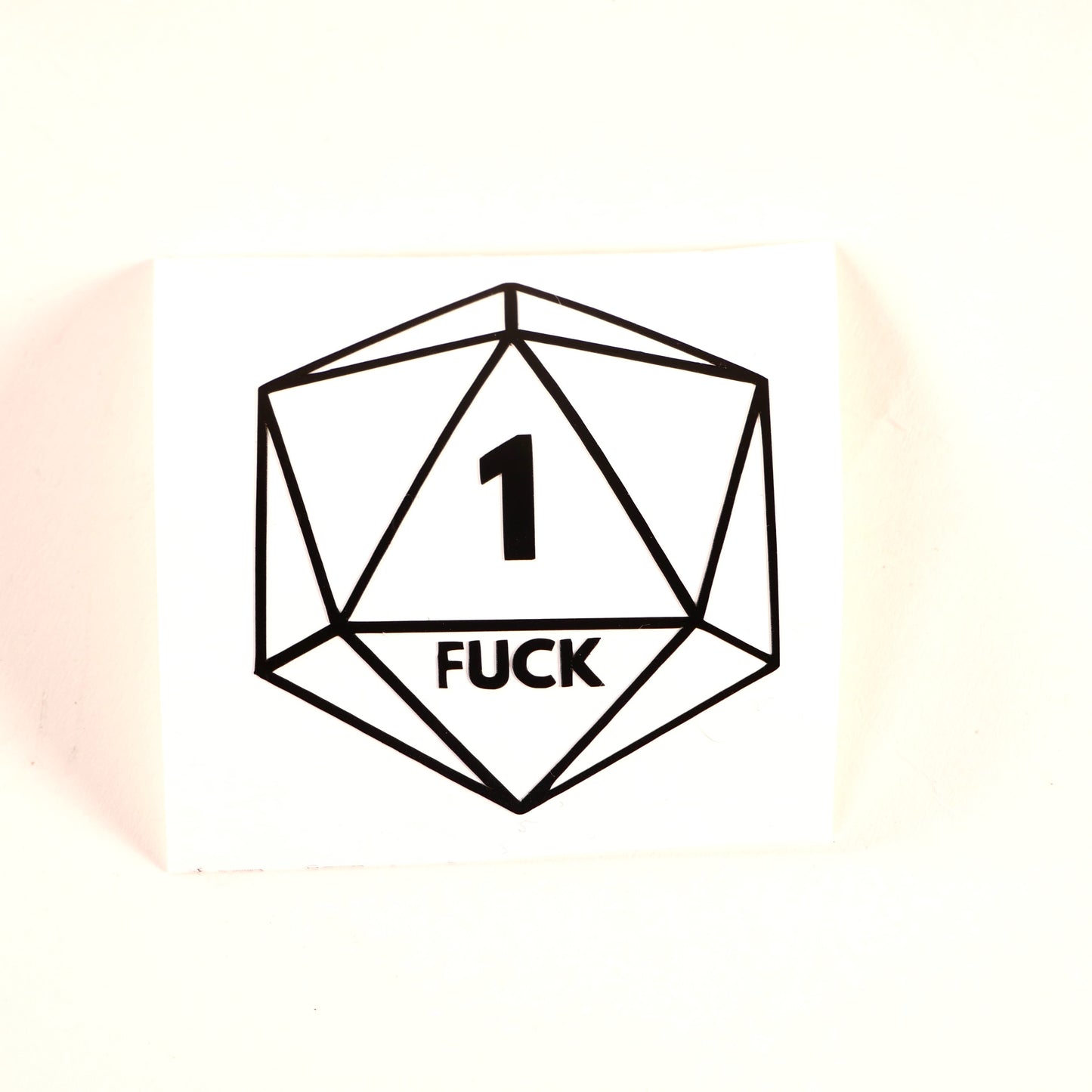 Hilarious D20 vinyl sticker featuring a Nat 1 critical fail with "1 FUCK" text. Perfect for DND players, dungeon masters, and tabletop RPG lovers.