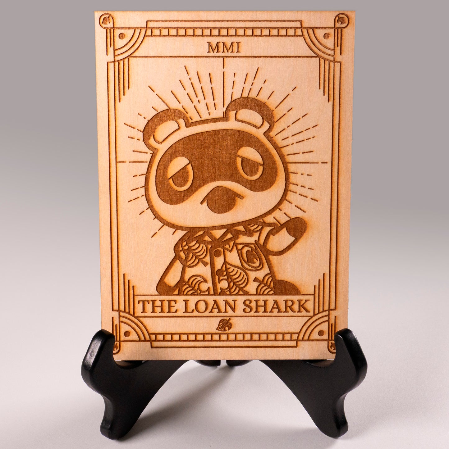 Laser-engraved wooden tarot card featuring Tom Nook as "The Loan Shark." Inspired by Animal Crossing, perfect for gamers, tarot lovers, and collectors. Cottagecore, cozy gaming decor.