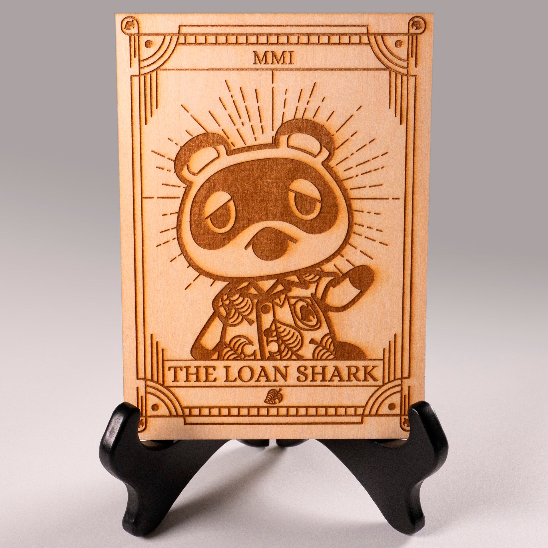 Laser-engraved wooden tarot card featuring Tom Nook as "The Loan Shark." Inspired by Animal Crossing, perfect for gamers, tarot lovers, and collectors. Cottagecore, cozy gaming decor.