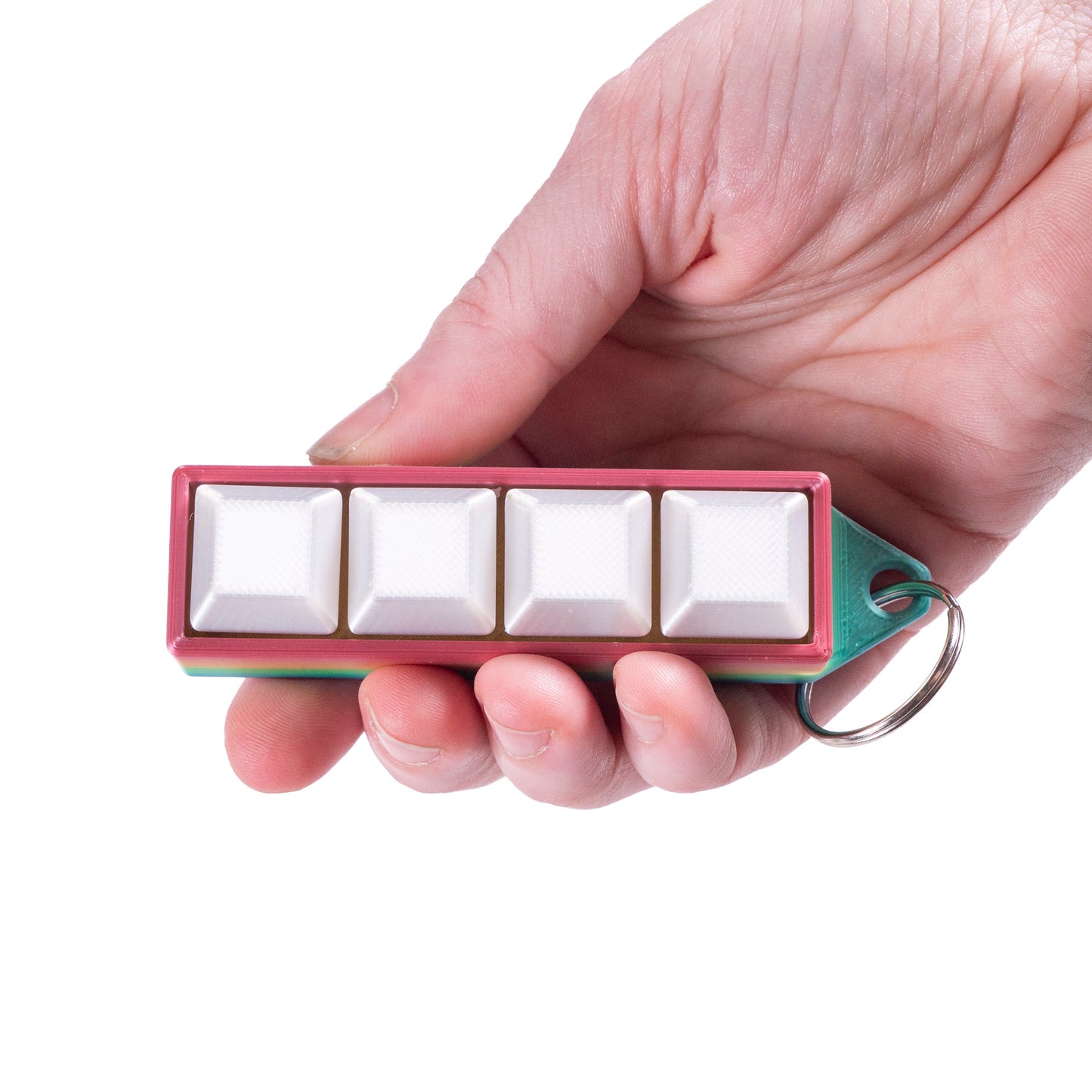 Rainbow 4-key mechanical clicker with white keycaps and keychain loop, perfect for fidgeting, gamer desk setups, or stress relief on the go.