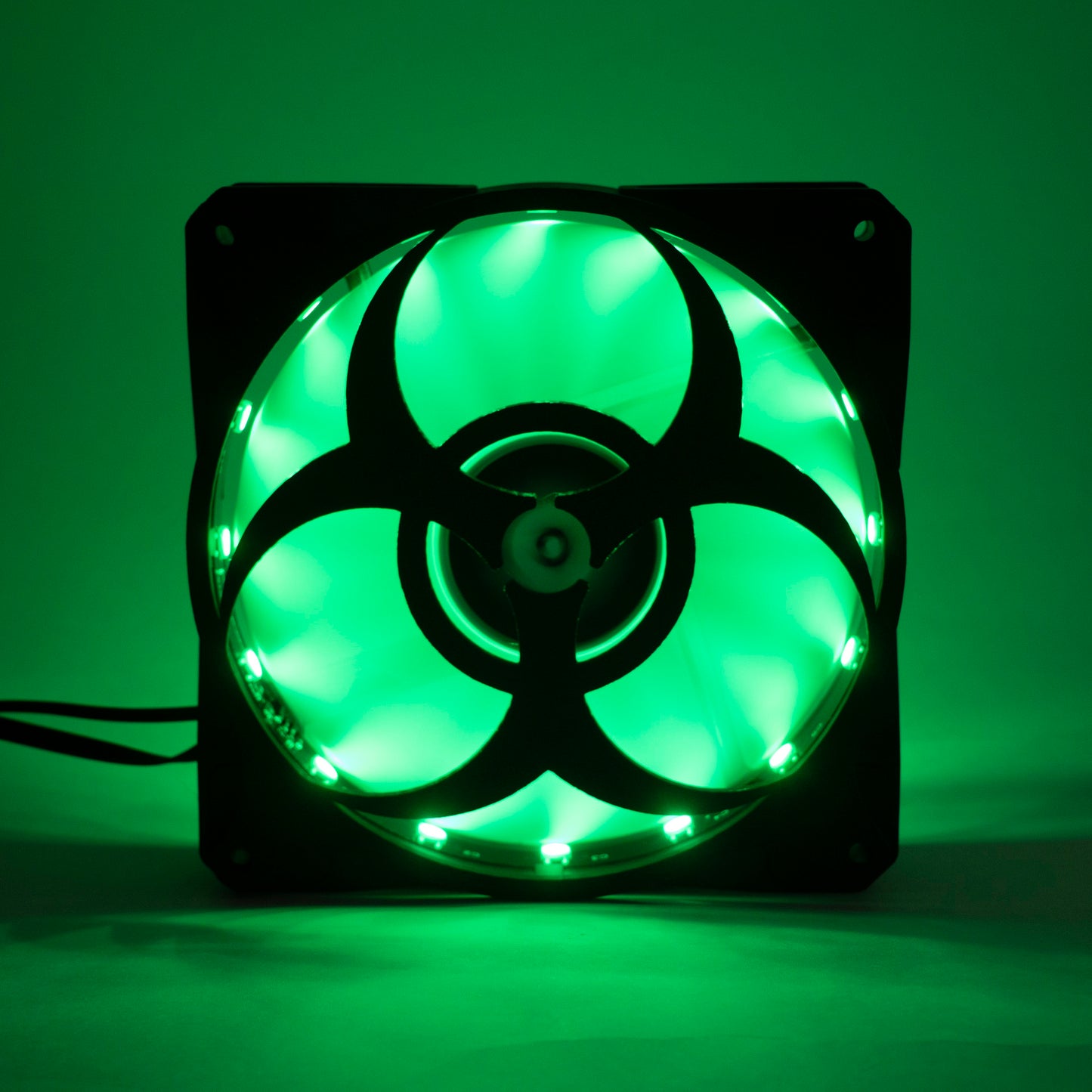 3D printed PC fan grill featuring a bold biohazard symbol. Perfect for custom gaming rigs, PC case mods, and fans of edgy, nerdy, or horror-inspired builds.