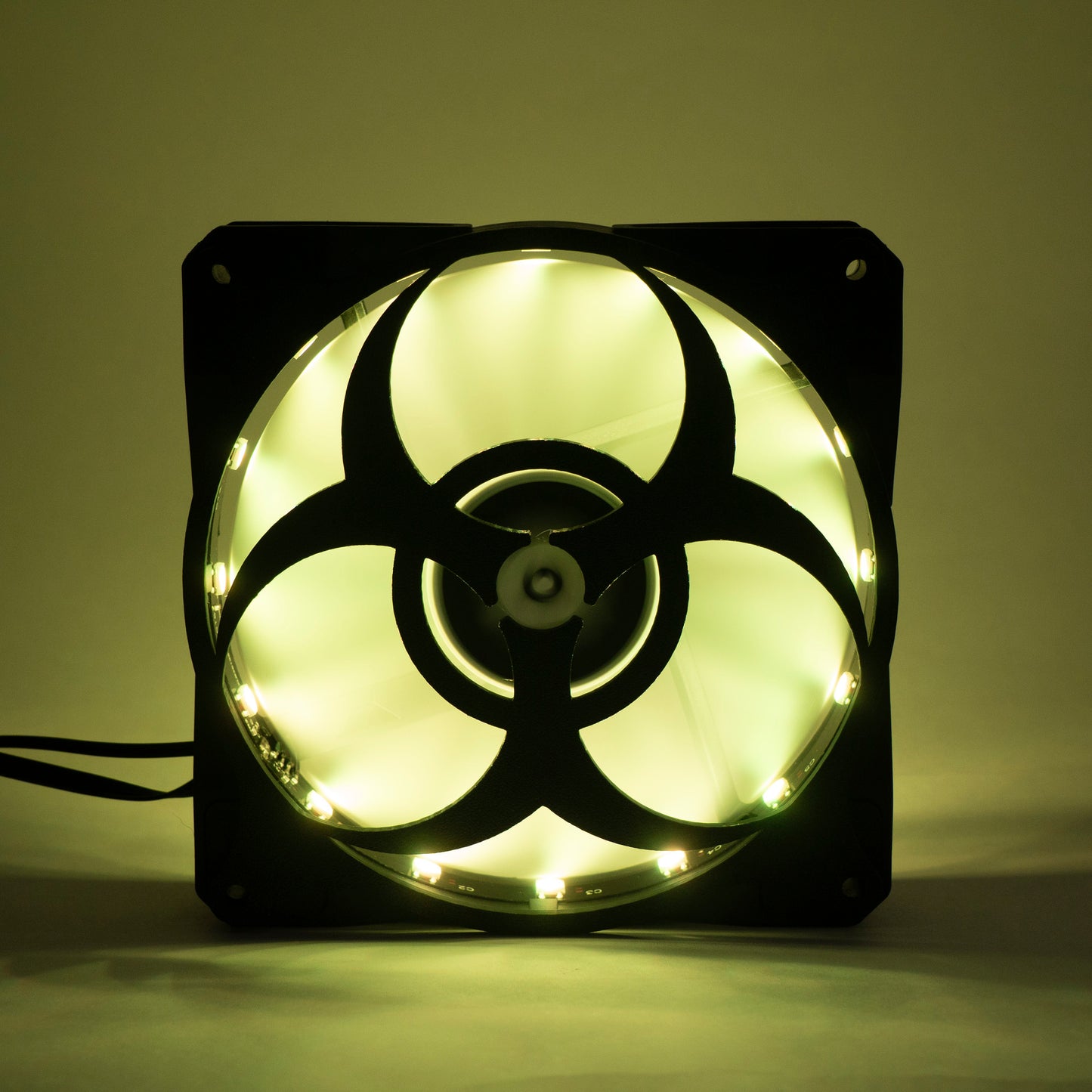 3D printed PC fan grill featuring a bold biohazard symbol. Perfect for custom gaming rigs, PC case mods, and fans of edgy, nerdy, or horror-inspired builds.