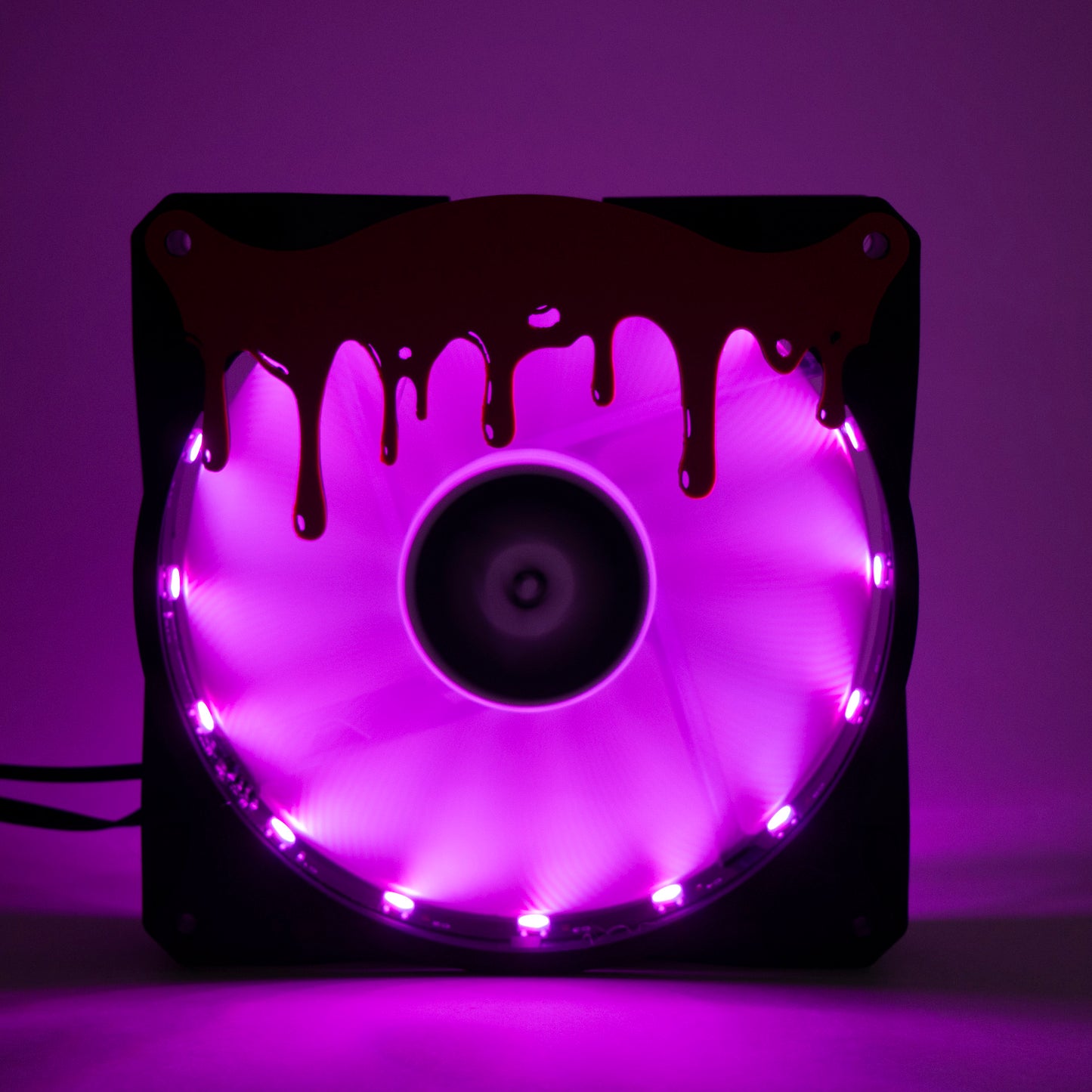3D printed blood drip fan grill for PC case mods. Adds spooky horror vibes to any gaming setup. Perfect for Halloween or creepy gamer aesthetics.