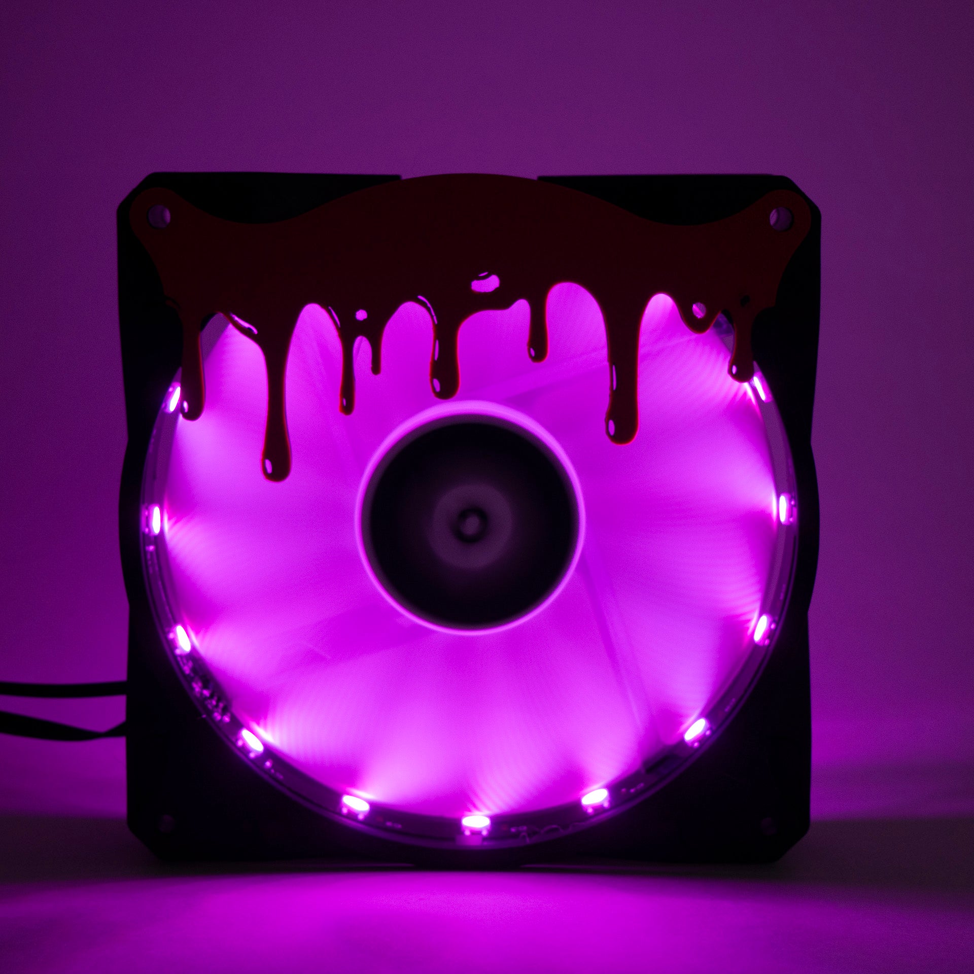 3D printed blood drip fan grill for PC case mods. Adds spooky horror vibes to any gaming setup. Perfect for Halloween or creepy gamer aesthetics.