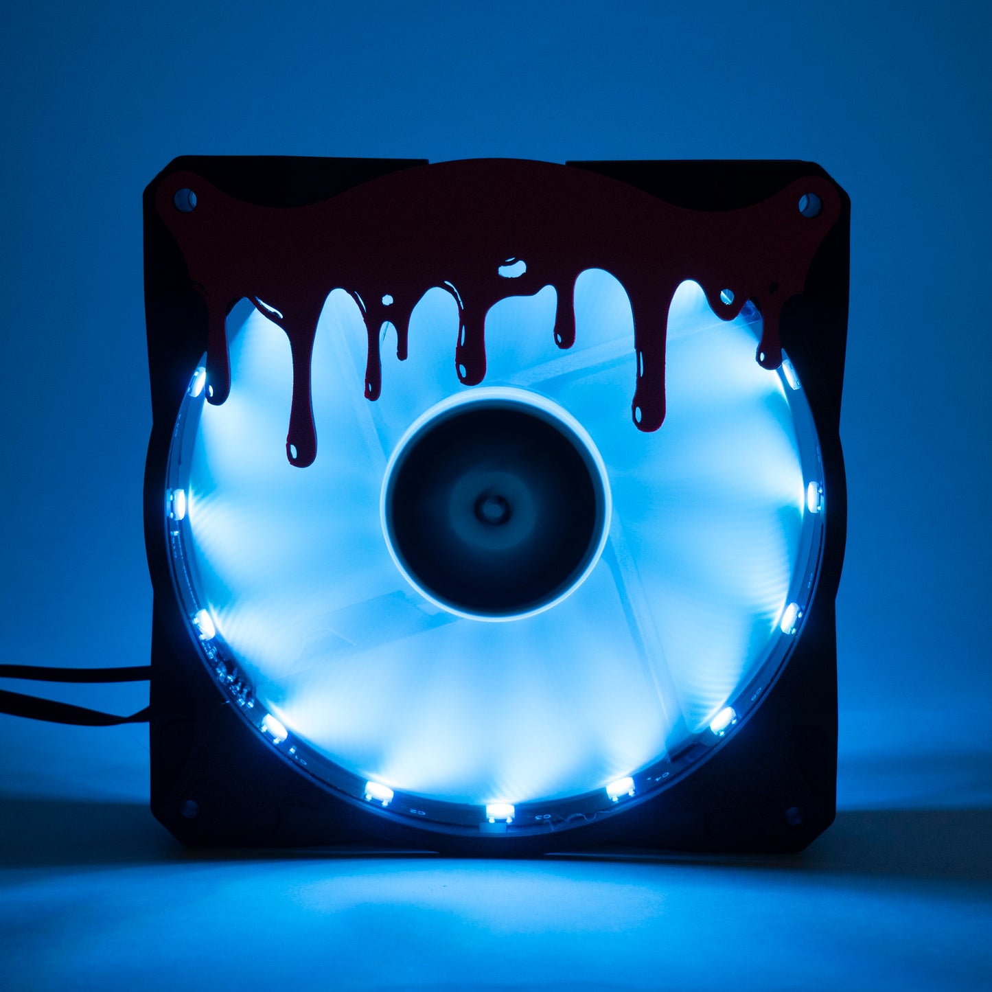 3D printed blood drip fan grill for PC case mods. Adds spooky horror vibes to any gaming setup. Perfect for Halloween or creepy gamer aesthetics.