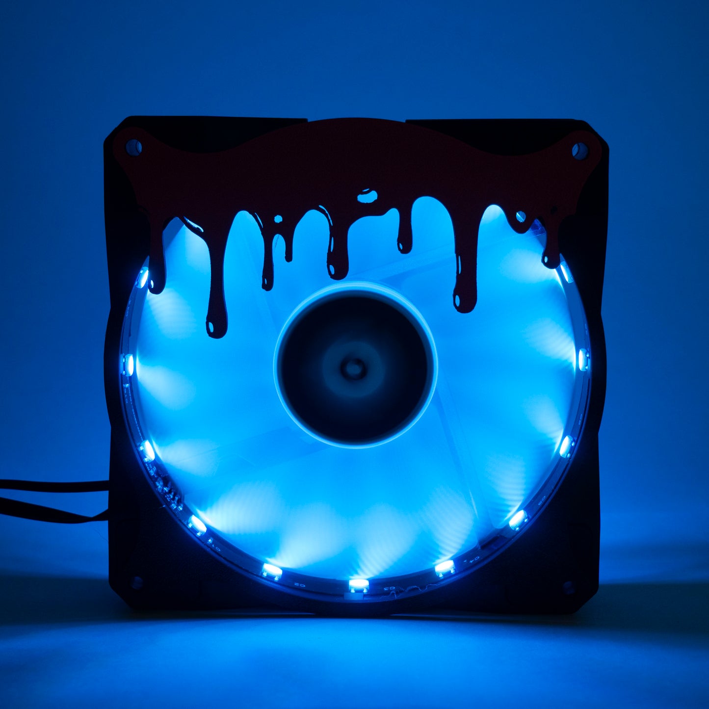 3D printed blood drip fan grill for PC case mods. Adds spooky horror vibes to any gaming setup. Perfect for Halloween or creepy gamer aesthetics.