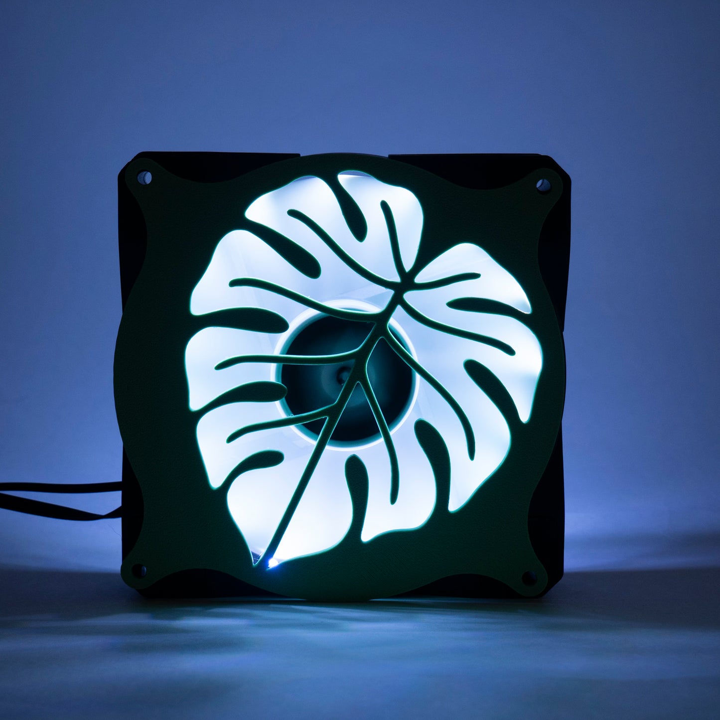 A 3D printed monstera leaf PC fan grill for plant lovers and cozy gamer setups. Adds botanical flair to any gaming tower or aesthetic workspace.