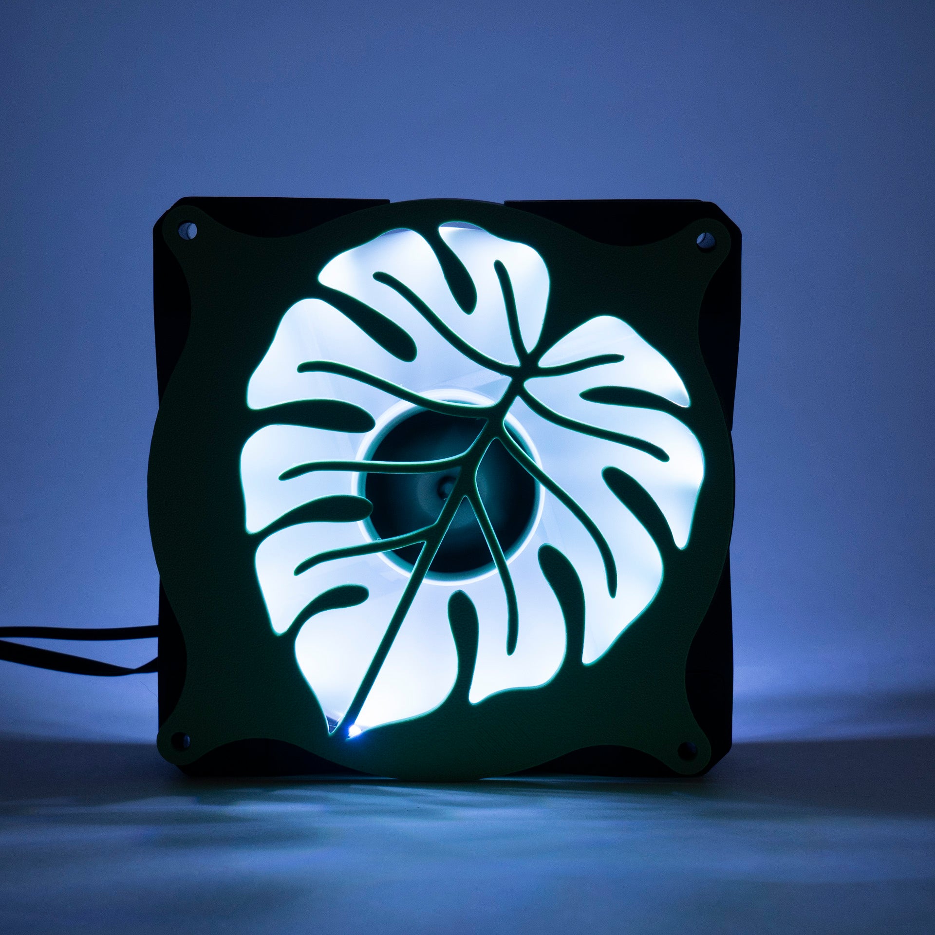 A 3D printed monstera leaf PC fan grill for plant lovers and cozy gamer setups. Adds botanical flair to any gaming tower or aesthetic workspace.