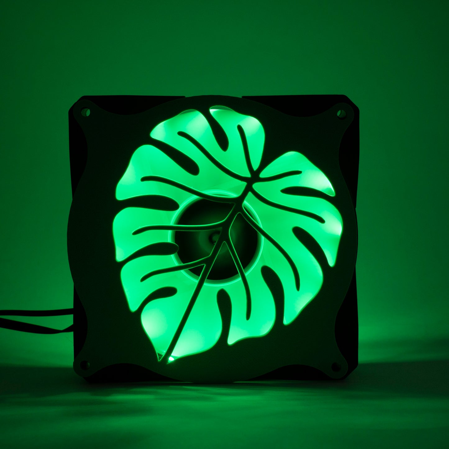 A 3D printed monstera leaf PC fan grill for plant lovers and cozy gamer setups. Adds botanical flair to any gaming tower or aesthetic workspace.