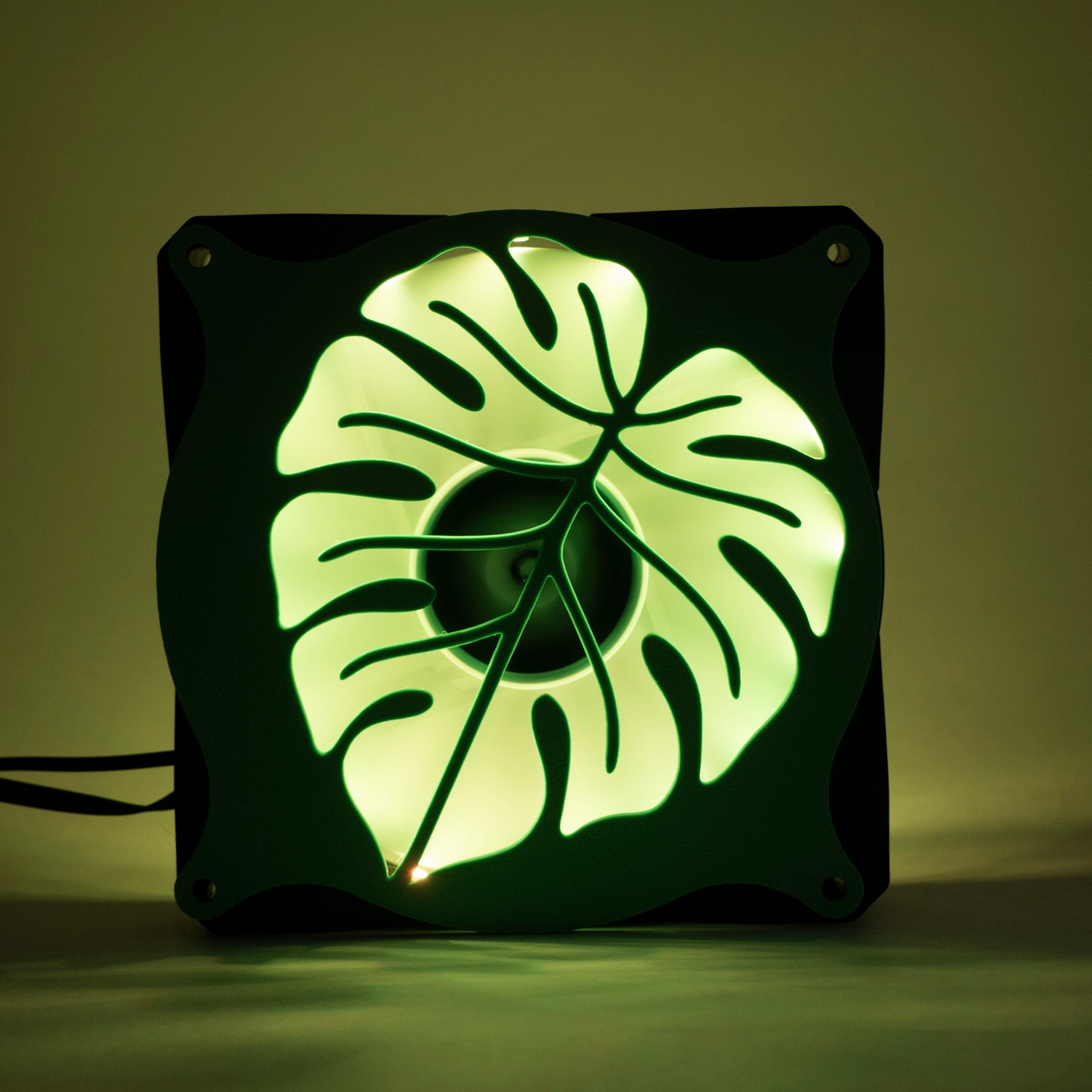 A 3D printed monstera leaf PC fan grill for plant lovers and cozy gamer setups. Adds botanical flair to any gaming tower or aesthetic workspace.