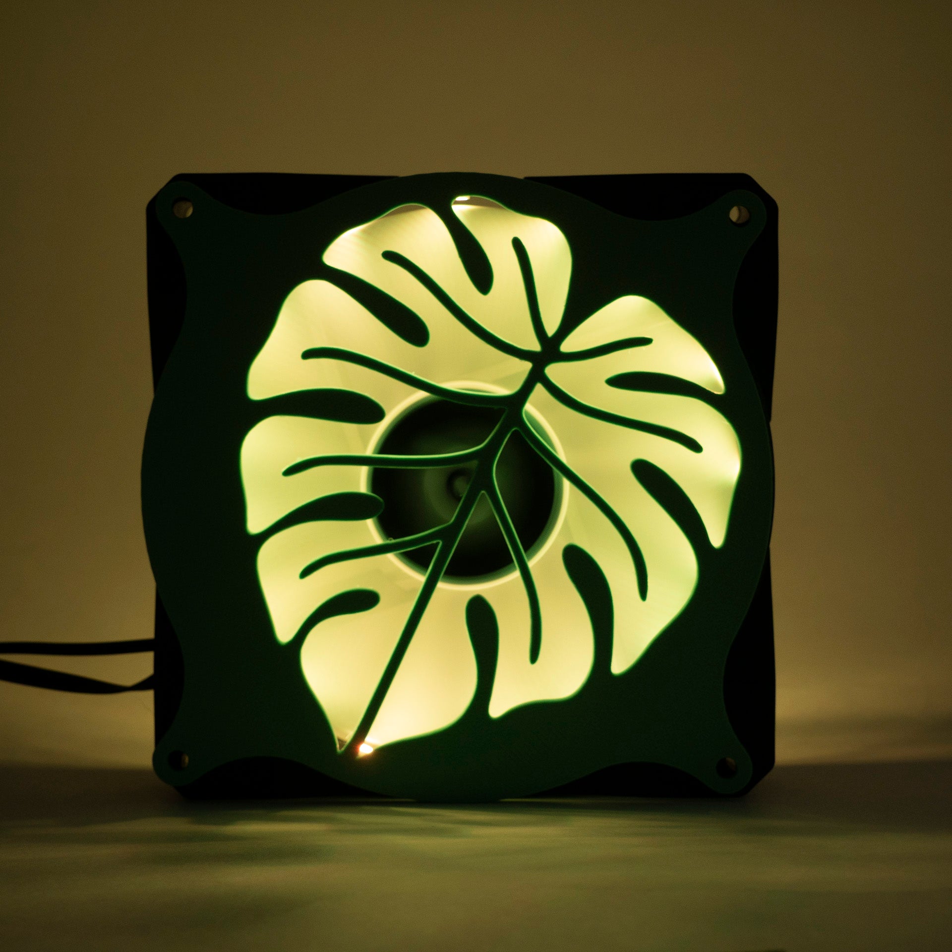 A 3D printed monstera leaf PC fan grill for plant lovers and cozy gamer setups. Adds botanical flair to any gaming tower or aesthetic workspace.