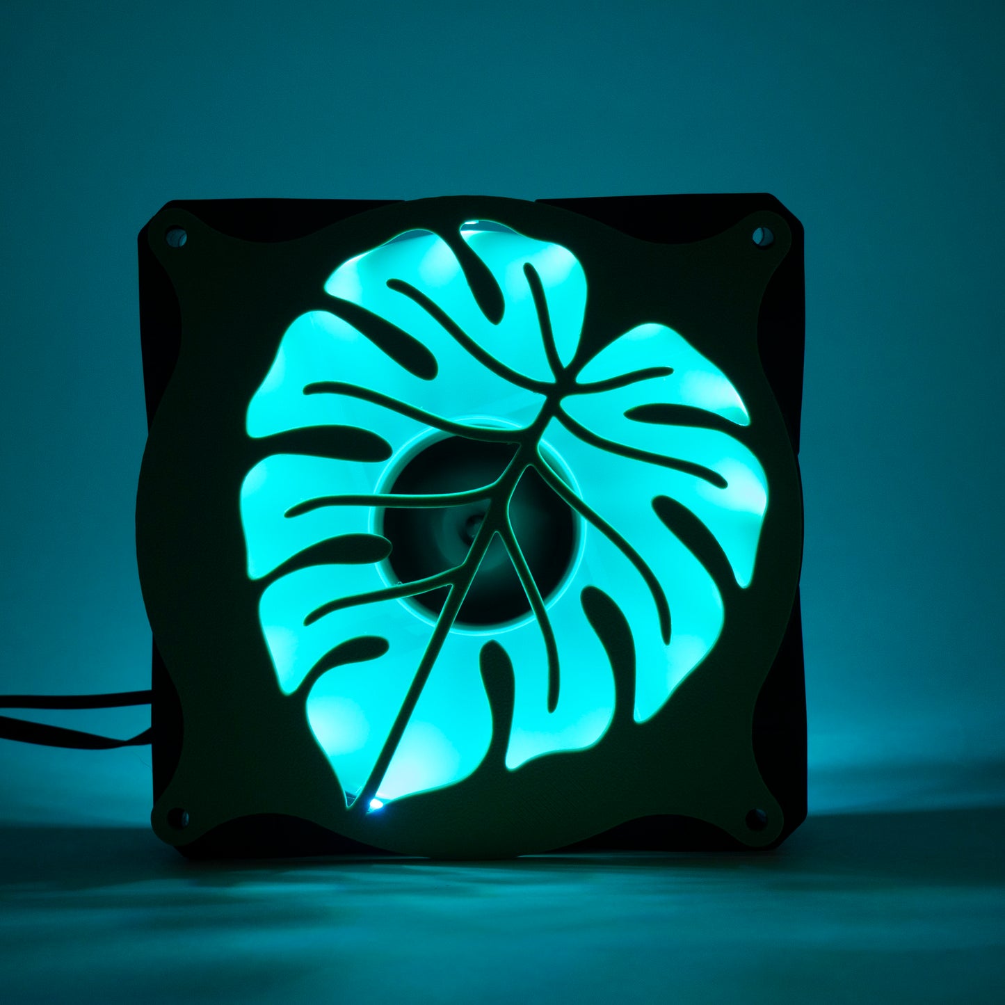 A 3D printed monstera leaf PC fan grill for plant lovers and cozy gamer setups. Adds botanical flair to any gaming tower or aesthetic workspace.