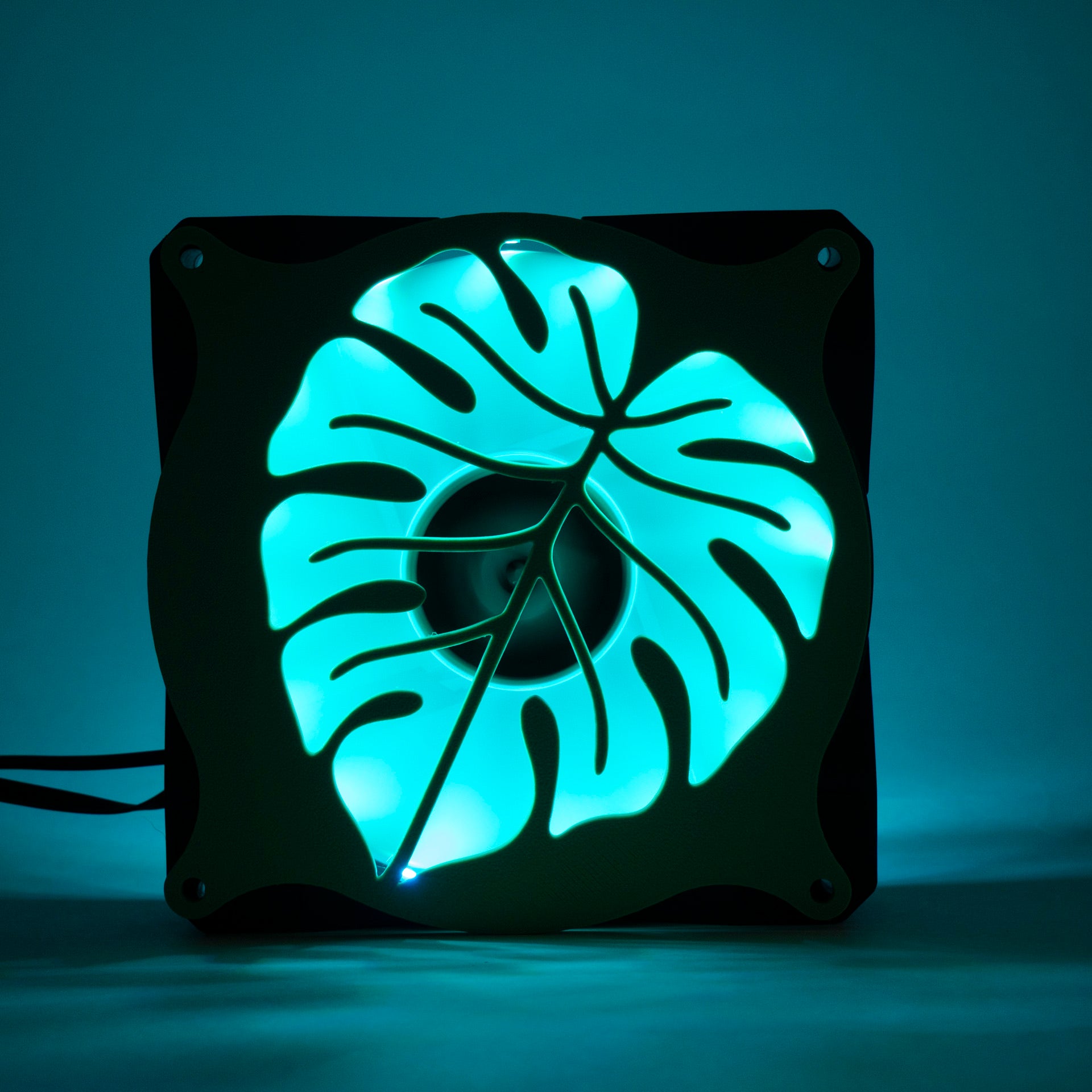 A 3D printed monstera leaf PC fan grill for plant lovers and cozy gamer setups. Adds botanical flair to any gaming tower or aesthetic workspace.
