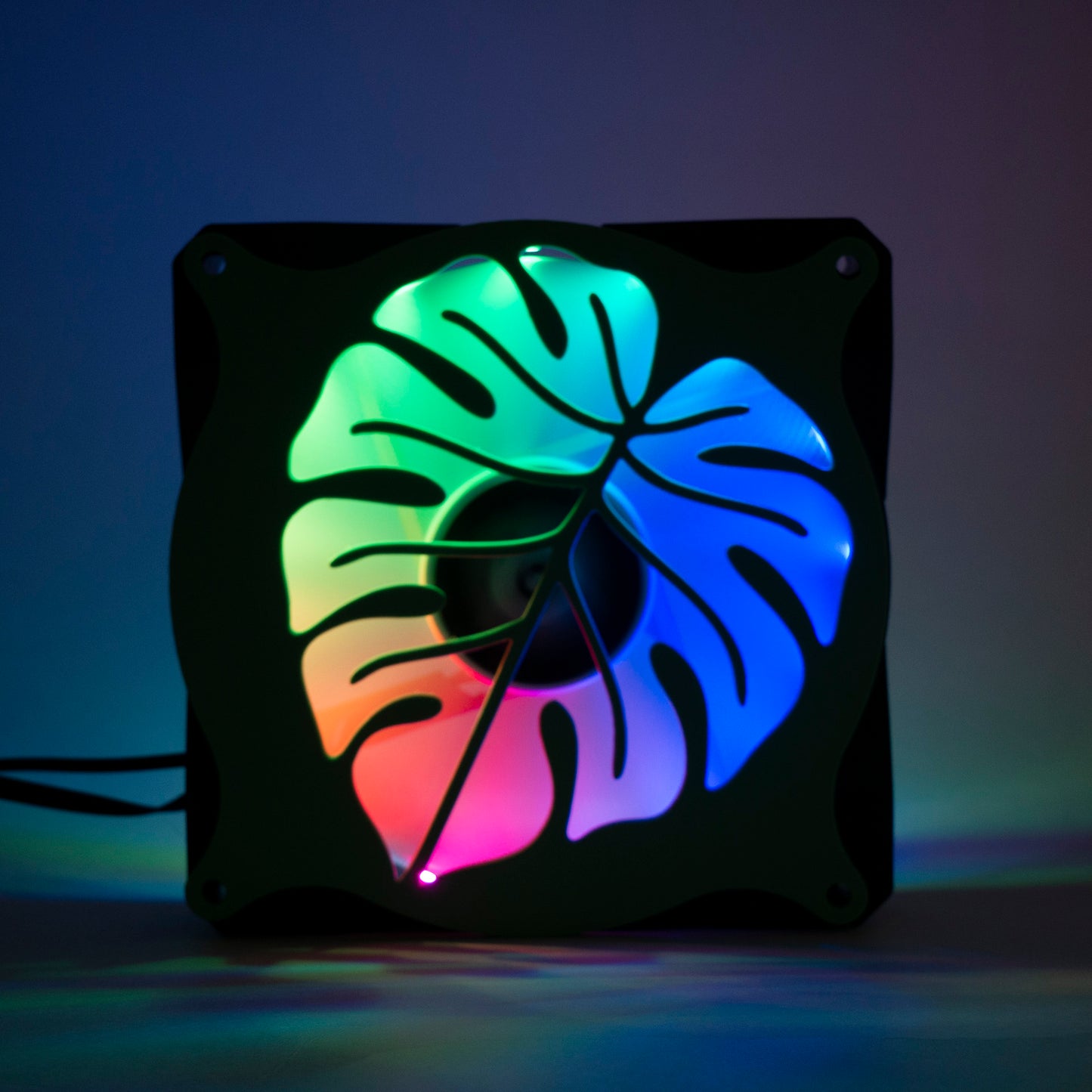 A 3D printed monstera leaf PC fan grill for plant lovers and cozy gamer setups. Adds botanical flair to any gaming tower or aesthetic workspace.