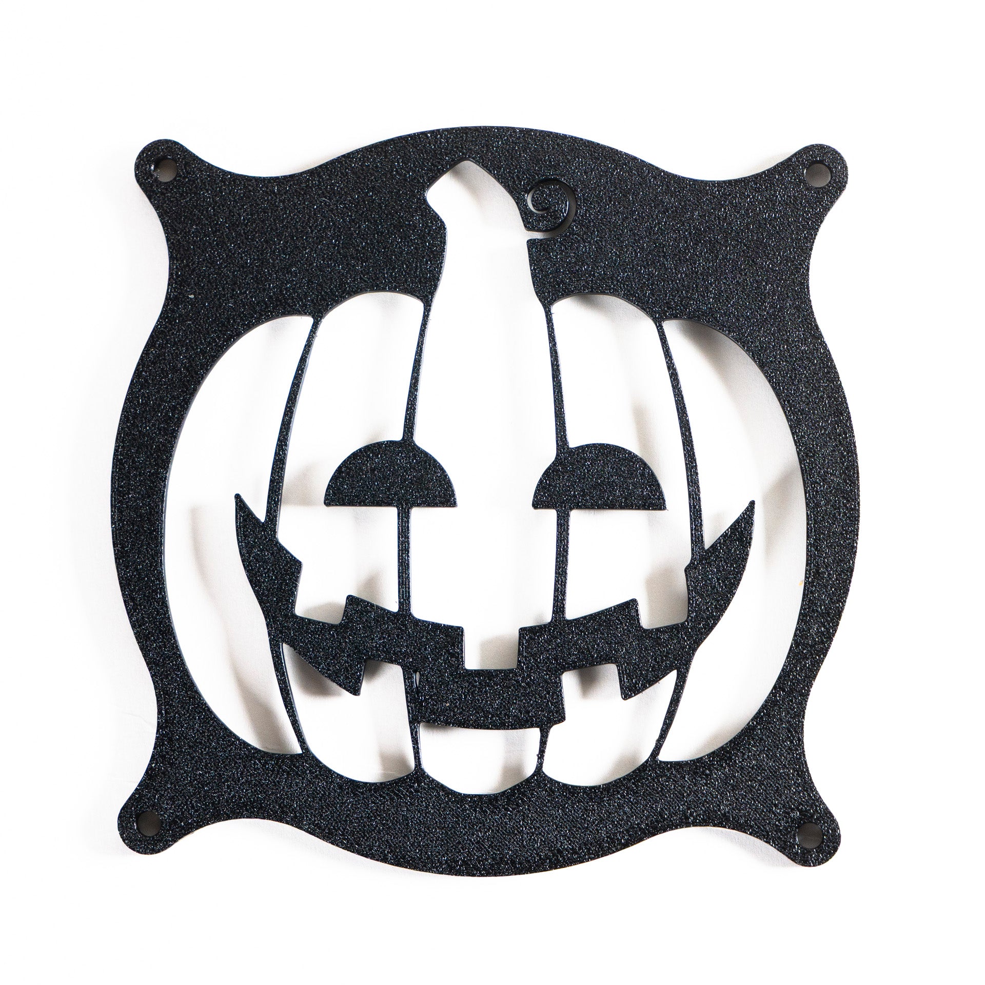 3D printed PC fan grill shaped like a spooky jack-o'-lantern pumpkin. Perfect Halloween-themed case mod for gamers and tech lovers.