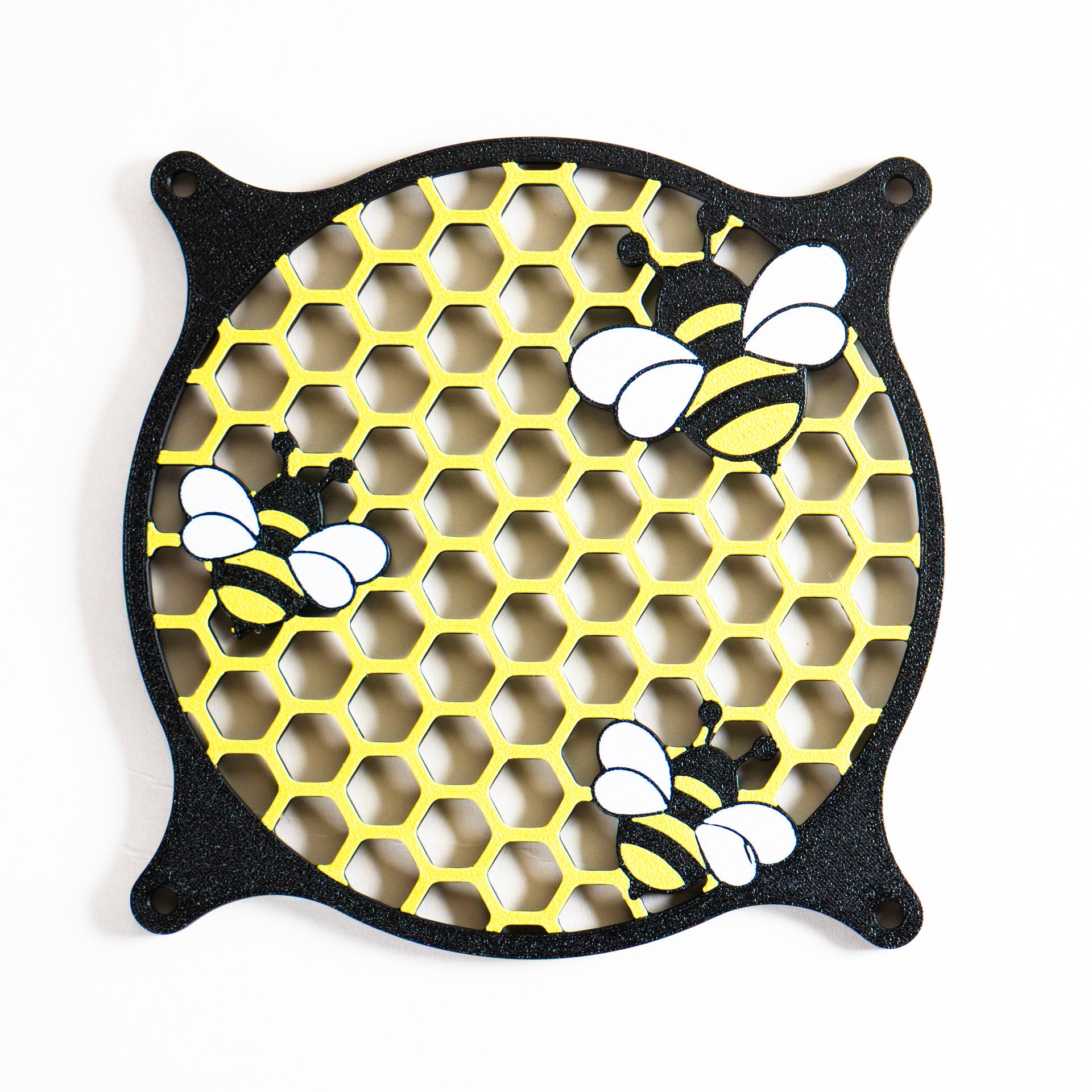 Adorable 3D printed PC fan grill featuring bees and honeycomb. Perfect for customizing aesthetic gamer setups with a cute, nature-inspired design.