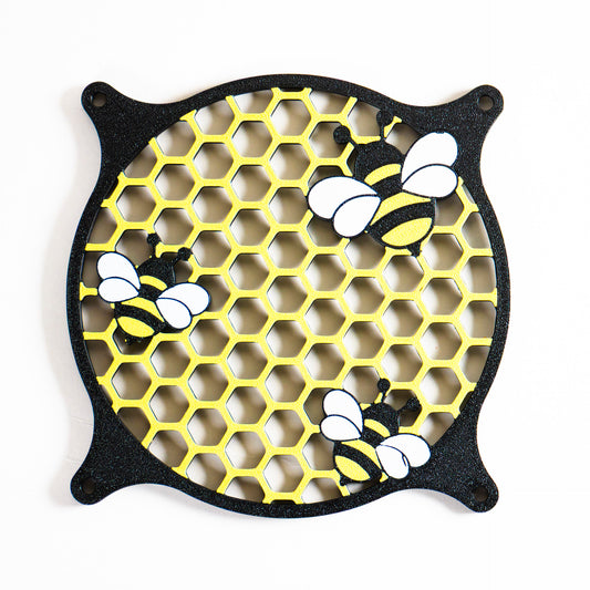 Adorable 3D printed PC fan grill featuring bees and honeycomb. Perfect for customizing aesthetic gamer setups with a cute, nature-inspired design.