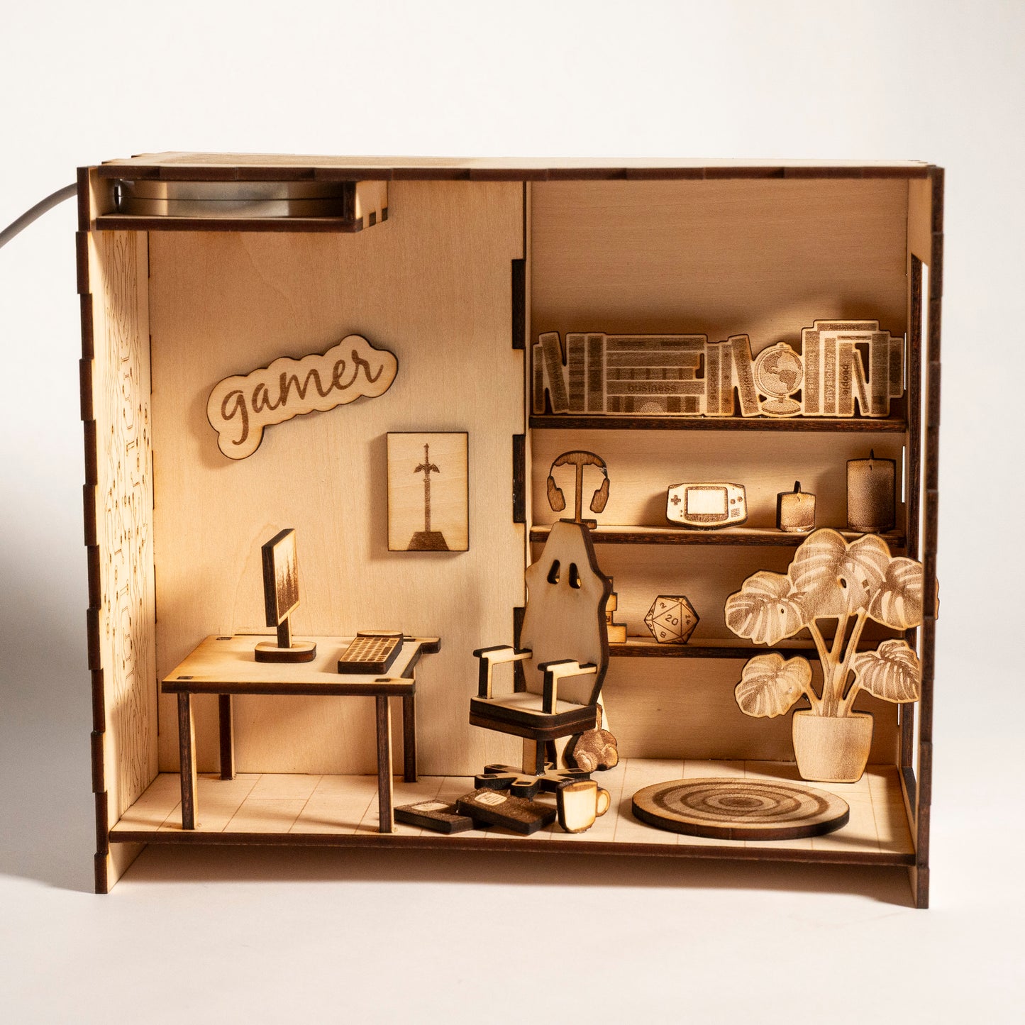 DIY gaming PC book nook kit made from laser-engraved basswood with LED light and remote. A perfect gamer gift and bookshelf insert for tech lovers.