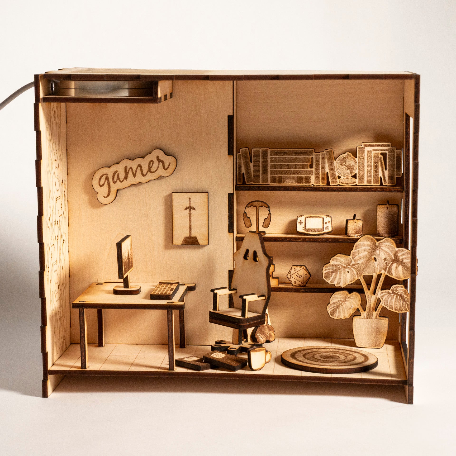 DIY gaming PC book nook kit made from laser-engraved basswood with LED light and remote. A perfect gamer gift and bookshelf insert for tech lovers.