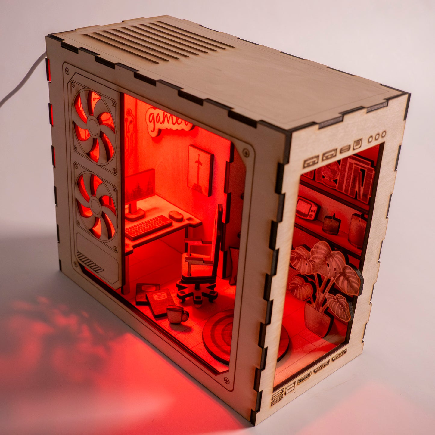 DIY gaming PC book nook kit made from laser-engraved basswood with LED light and remote. A perfect gamer gift and bookshelf insert for tech lovers.