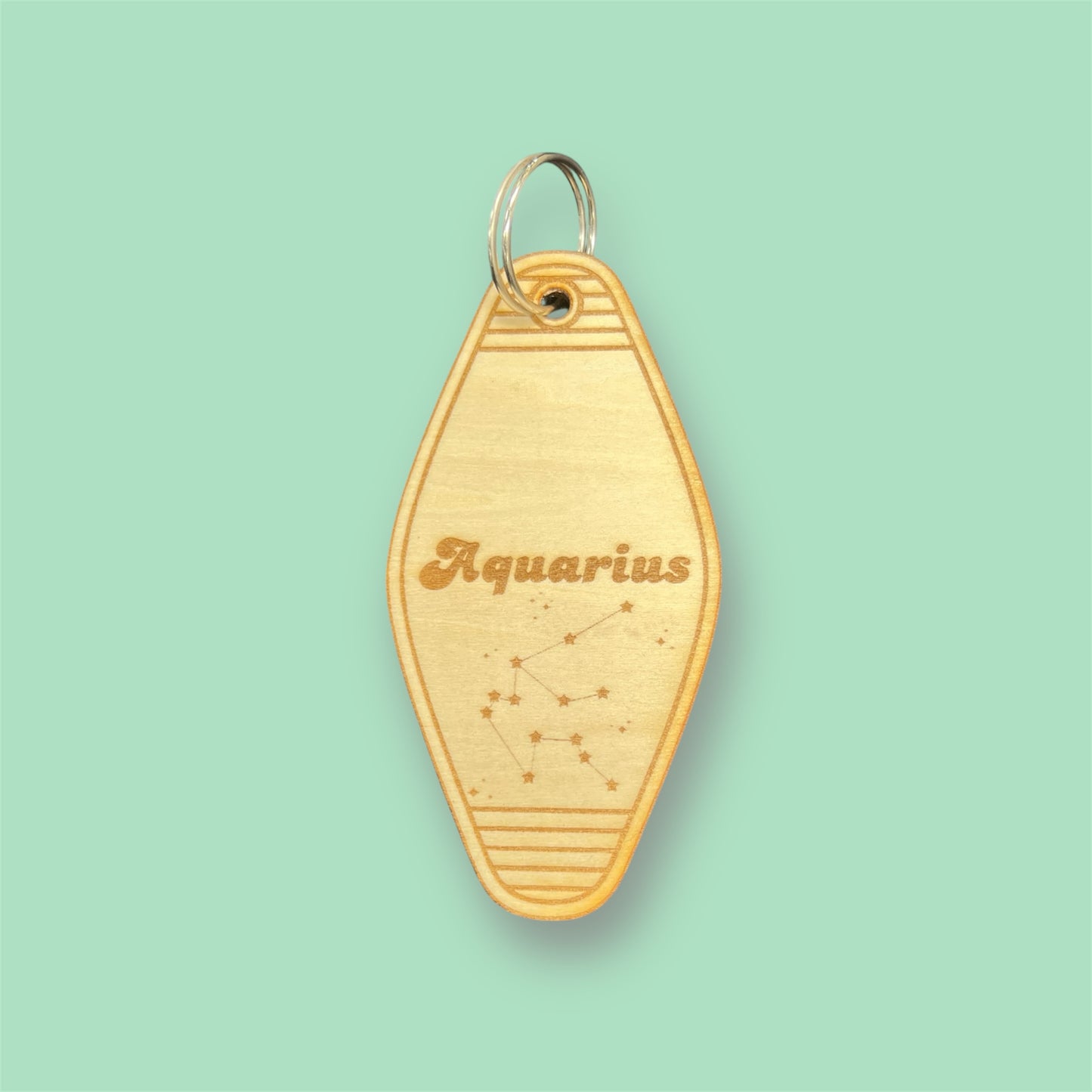 Laser engraved wood motel keychain featuring zodiac names and constellations, perfect for astrology lovers, horoscope fans, and retro gift collectors. This is for the Zodiac sign Aquarius.