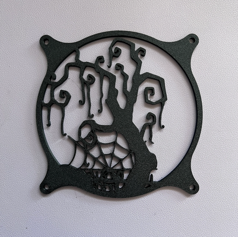 Decorative PC fan cover featuring a twisted tree and spider web design, ideal for adding a spooky touch to your gaming setup. Crafted from high-quality materials, this cover is compatible with standard 120mm fans.