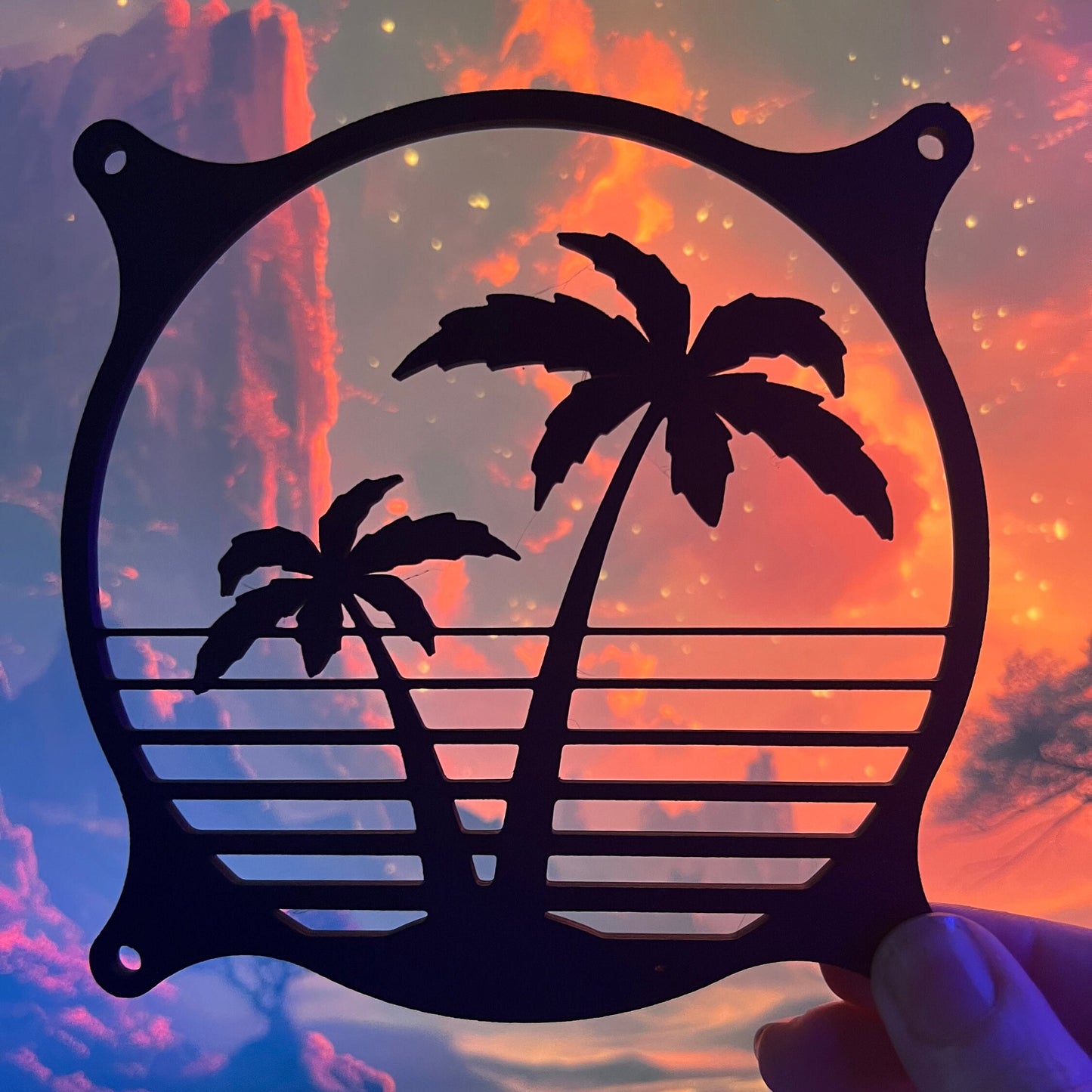 Decorative PC fan cover featuring an 80s tropical palm tree design with a black textured finish. Perfect for adding a unique and stylish touch to gaming or custom PC builds, blending functionality with aesthetic flair.