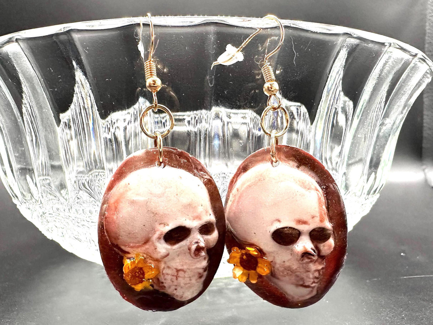 Floral Skull Dangle Earrings: Brass and Resin