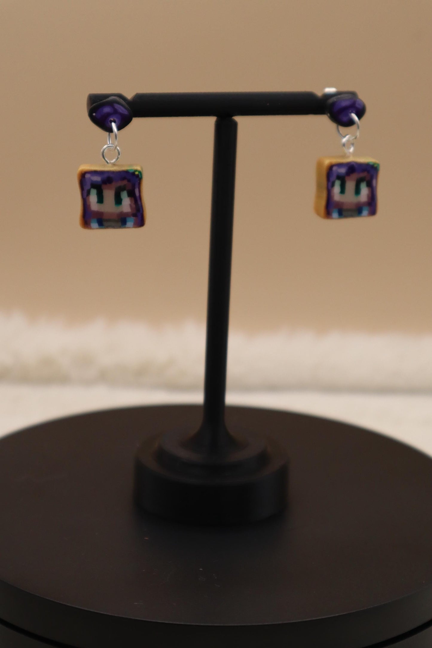 Handmade dangle earrings inspired by Abigail’s love of amethysts in Stardew Valley. Perfect gamer girl gift, cosplay jewelry, or crystal fan accessory.