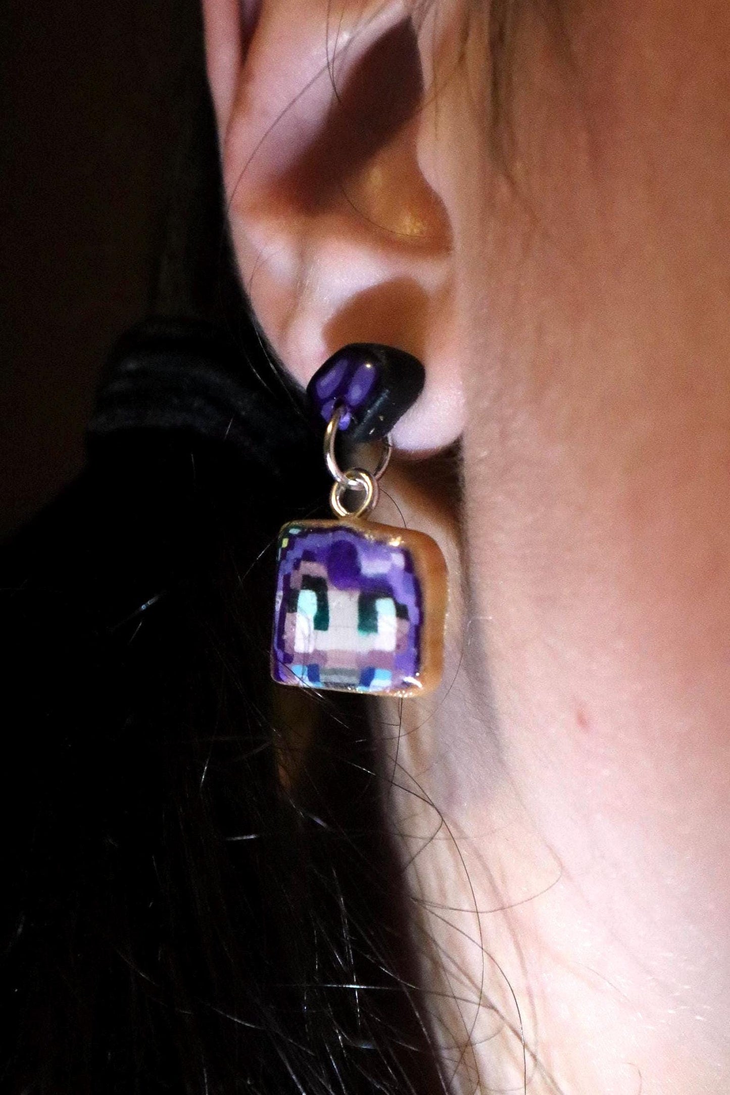 Handmade dangle earrings inspired by Abigail’s love of amethysts in Stardew Valley. Perfect gamer girl gift, cosplay jewelry, or crystal fan accessory.