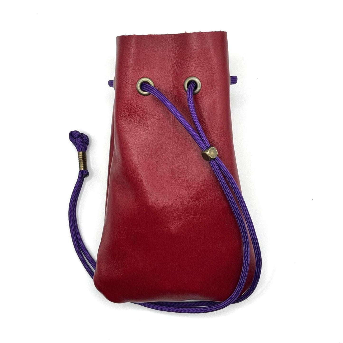 Handcrafted leather dice bag with drawstring, ideal for storing RPG dice sets. Perfect for DnD, tabletop games, or as a fantasy gift for gamers.