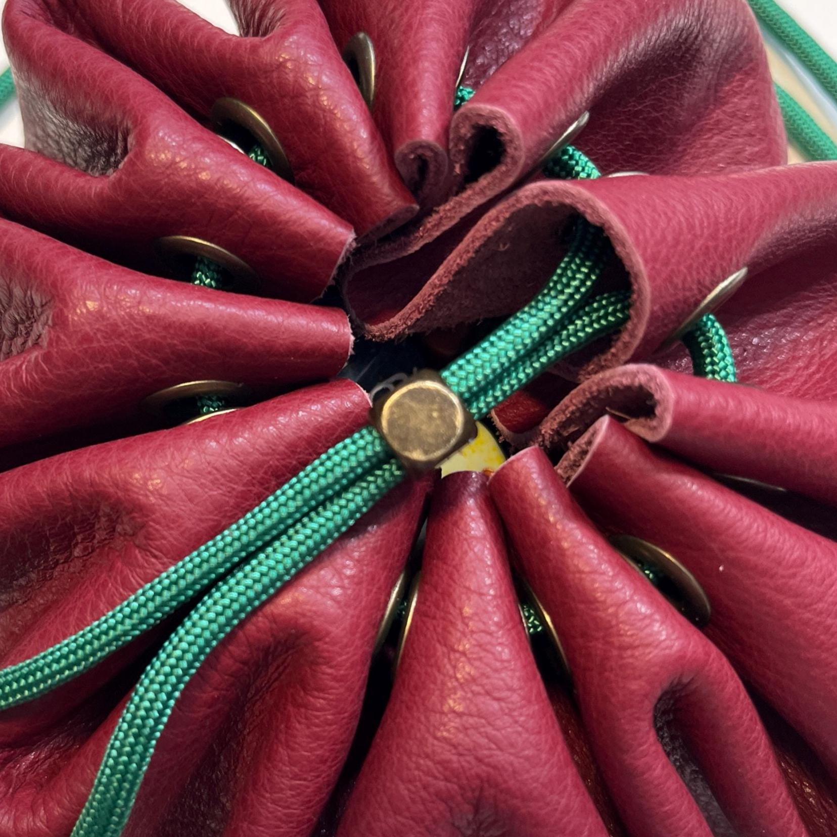 Handcrafted leather dice bag with drawstring, ideal for storing RPG dice sets. Perfect for DnD, tabletop games, or as a fantasy gift for gamers.