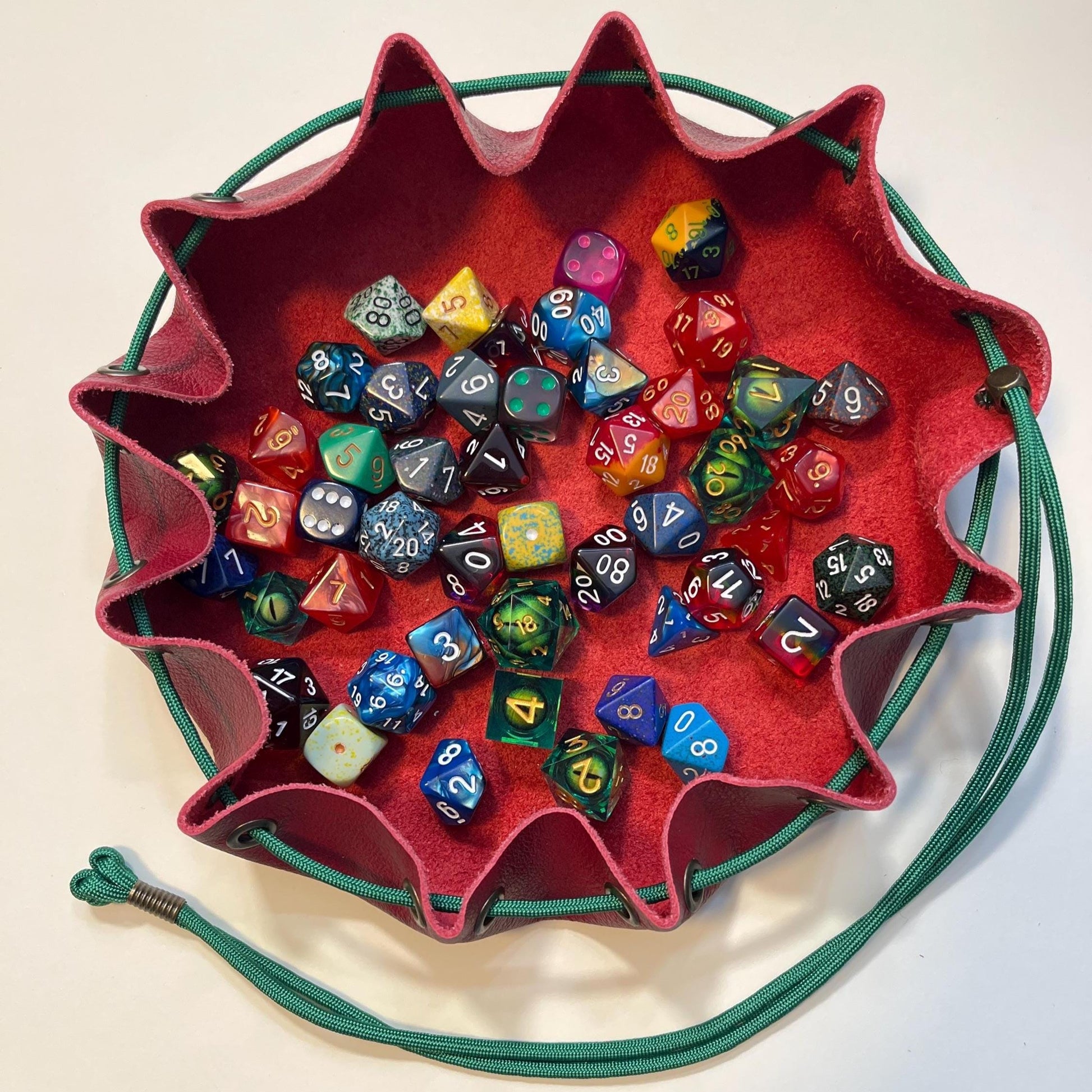 Top down view showcasing the tray functionality of the dice bag. Handmade potato-colored leather dice bag for RPG games like D&D. Durable pouch for tabletop gamers and collectors. Unique gift for role-playing game lovers.