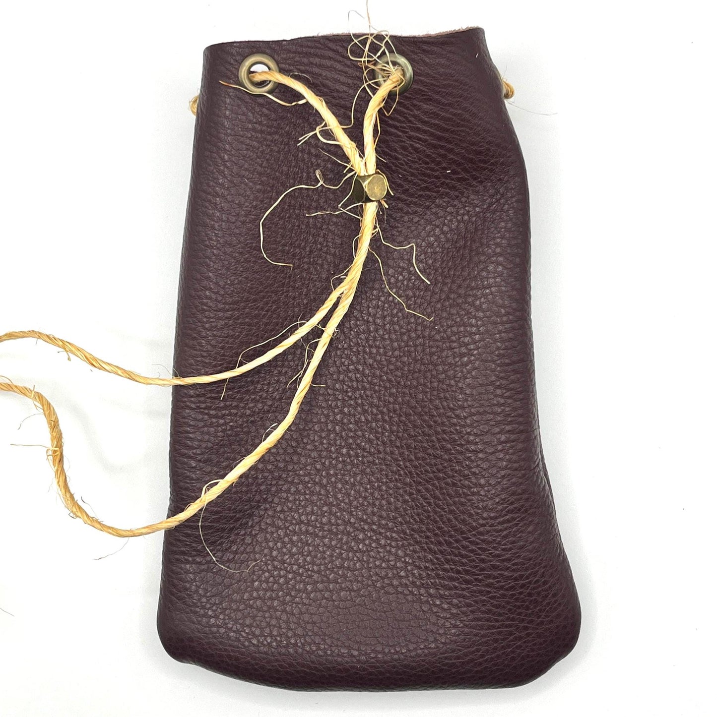 Handcrafted leather dice bag with drawstring, ideal for storing RPG dice sets. Perfect for DnD, tabletop games, or as a fantasy gift for gamers.