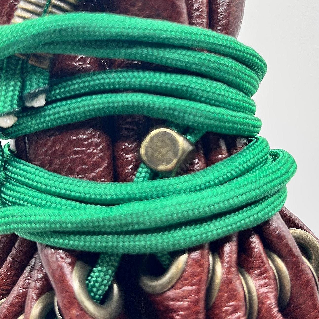 Handcrafted leather dice bag with drawstring, ideal for storing RPG dice sets. Perfect for DnD, tabletop games, or as a fantasy gift for gamers.