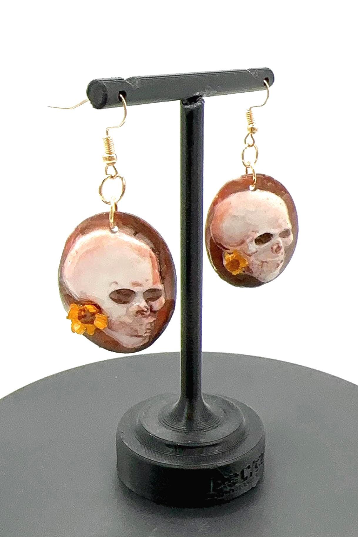 Floral Skull Dangle Earrings: Brass and Resin