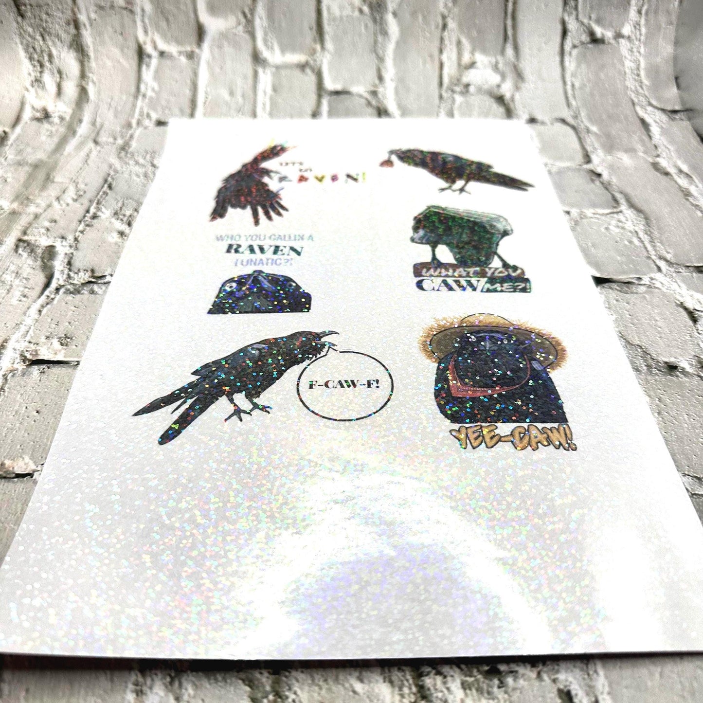Raven crow pun sticker sheet with funny bird wordplay. Gothic humor vinyl stickers featuring ravens and crows, perfect for laptops, journals, water bottles, and gifts.