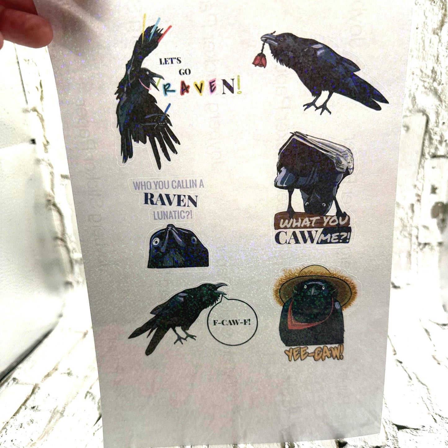 Raven crow pun sticker sheet with funny bird wordplay. Gothic humor vinyl stickers featuring ravens and crows, perfect for laptops, journals, water bottles, and gifts.