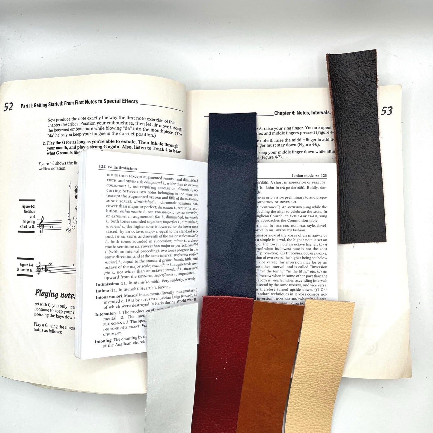 Handmade upcycled Italian leather bookmark cut from upholstery-grade leather scraps, slim durable page marker with natural grain, sustainable gift for readers and book lovers