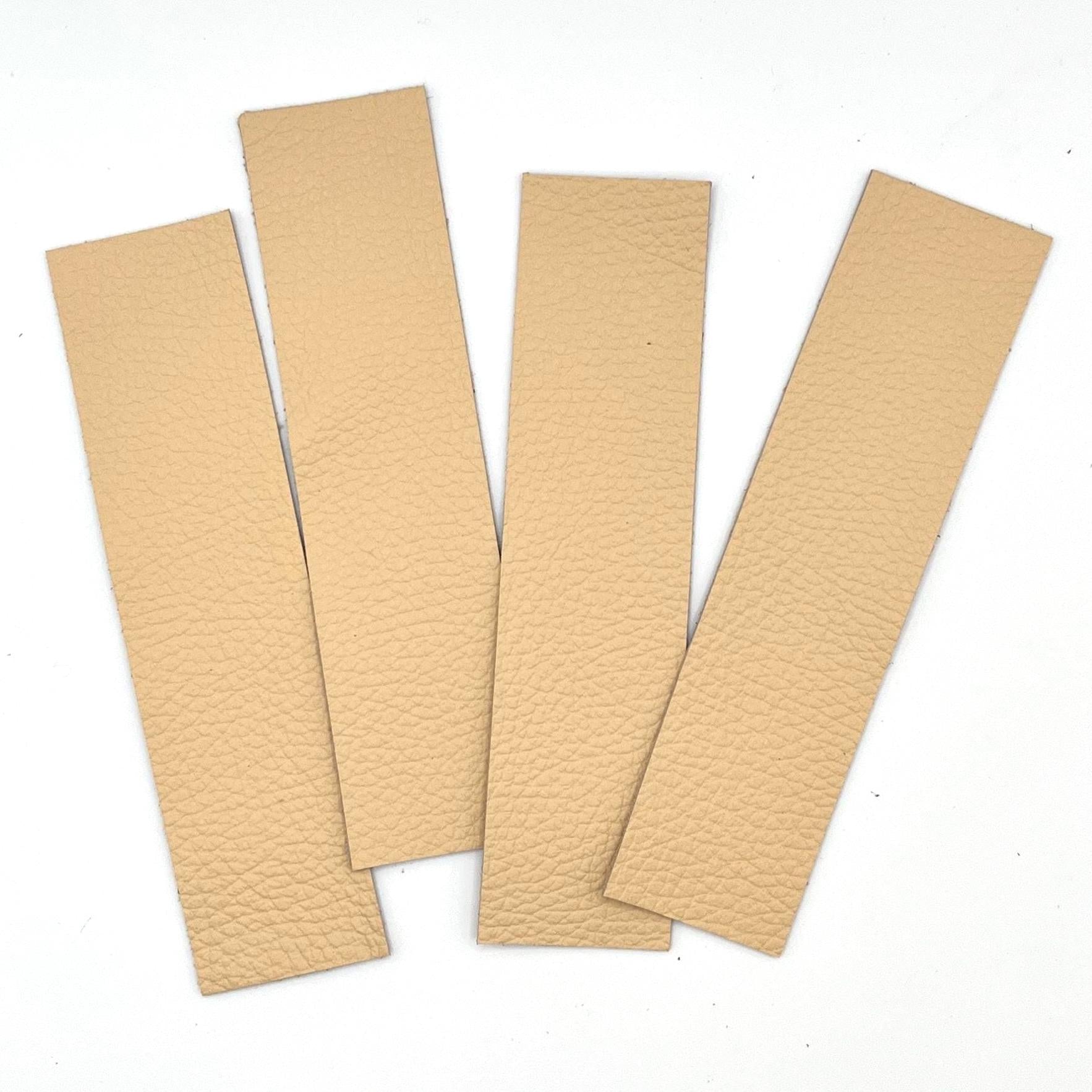 Handmade upcycled Italian leather bookmark cut from upholstery-grade leather scraps, slim durable page marker with natural grain, sustainable gift for readers and book lovers