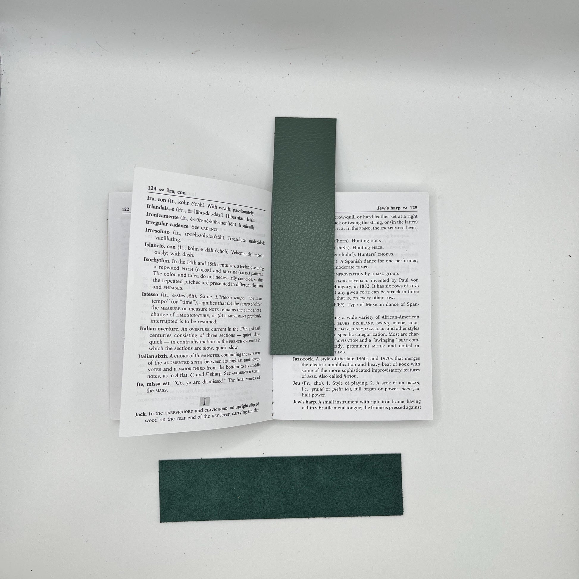Handmade upcycled Italian green leather bookmark cut from upholstery-grade leather scraps, slim durable page marker with natural grain, sustainable gift for readers and book lovers