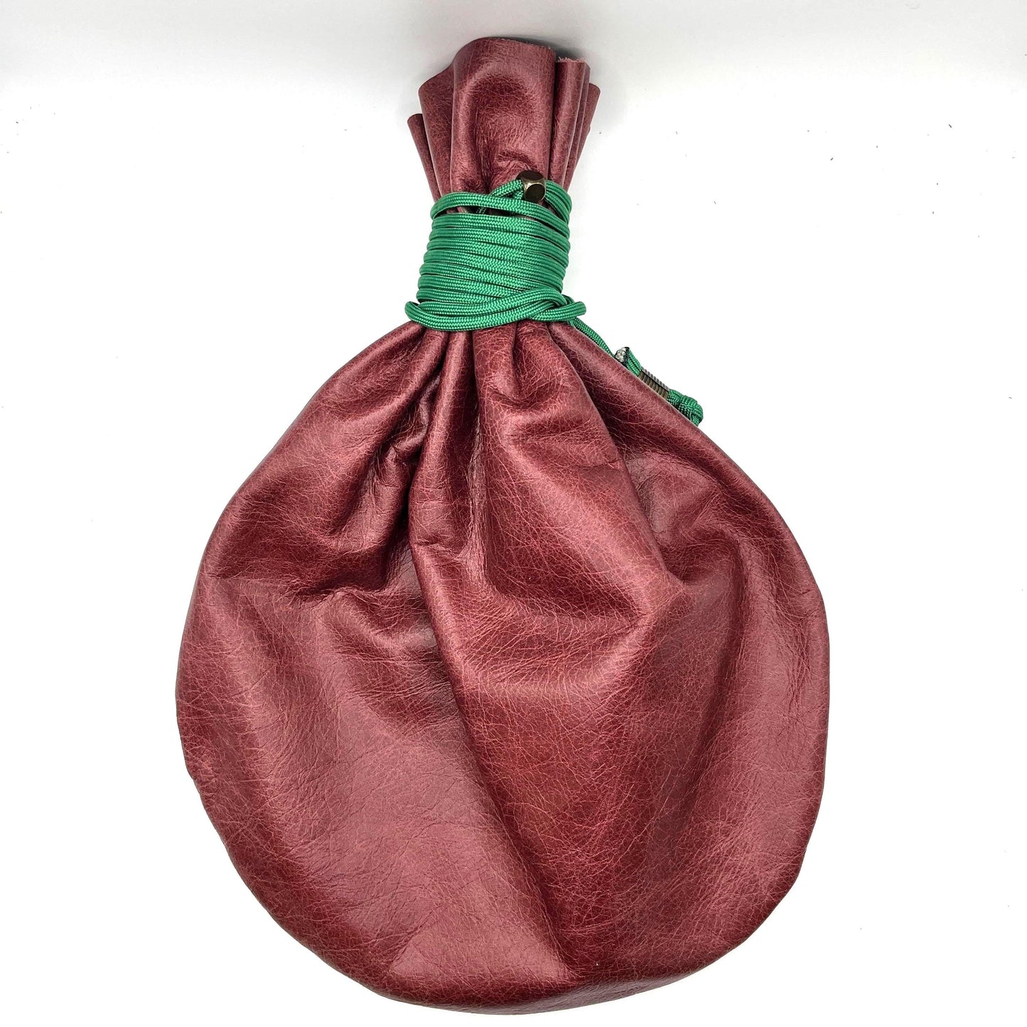 Handcrafted leather dice bag with drawstring, ideal for storing RPG dice sets. Perfect for DnD, tabletop games, or as a fantasy gift for gamers.