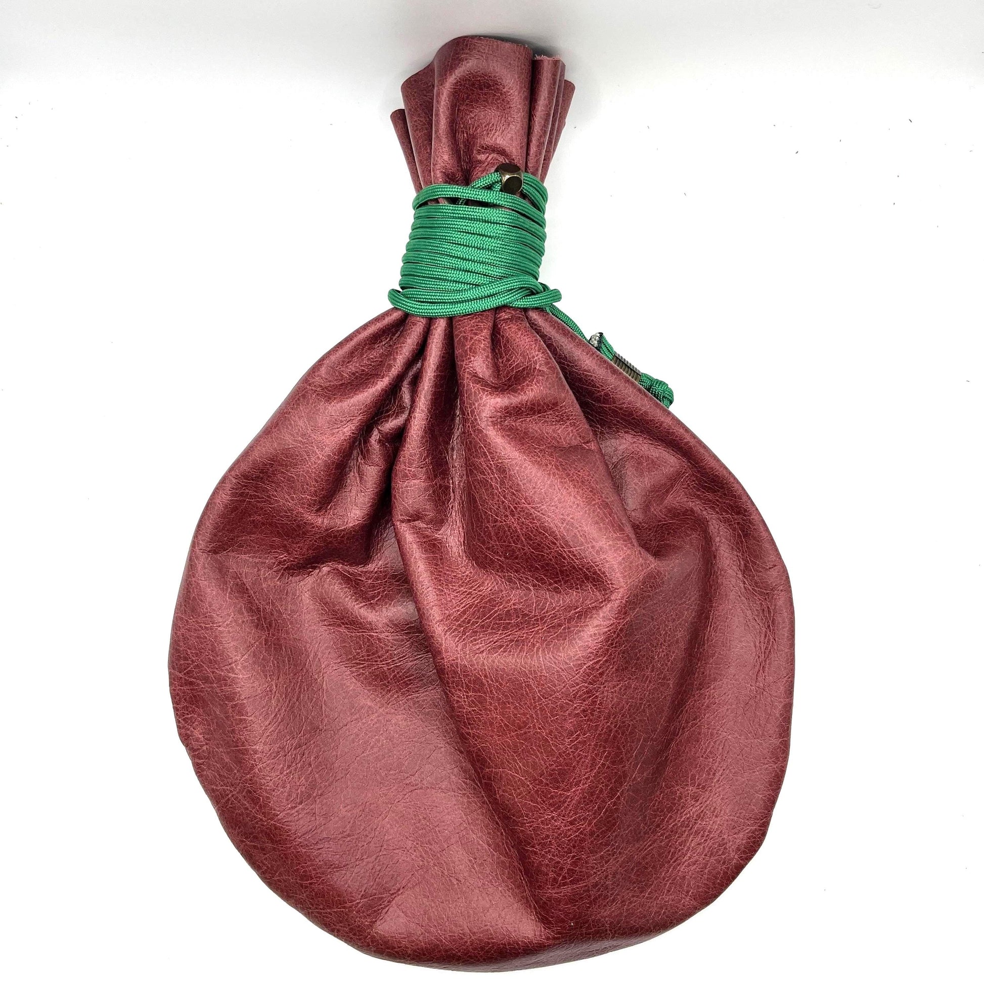 Handcrafted leather dice bag with drawstring, ideal for storing RPG dice sets. Perfect for DnD, tabletop games, or as a fantasy gift for gamers.
