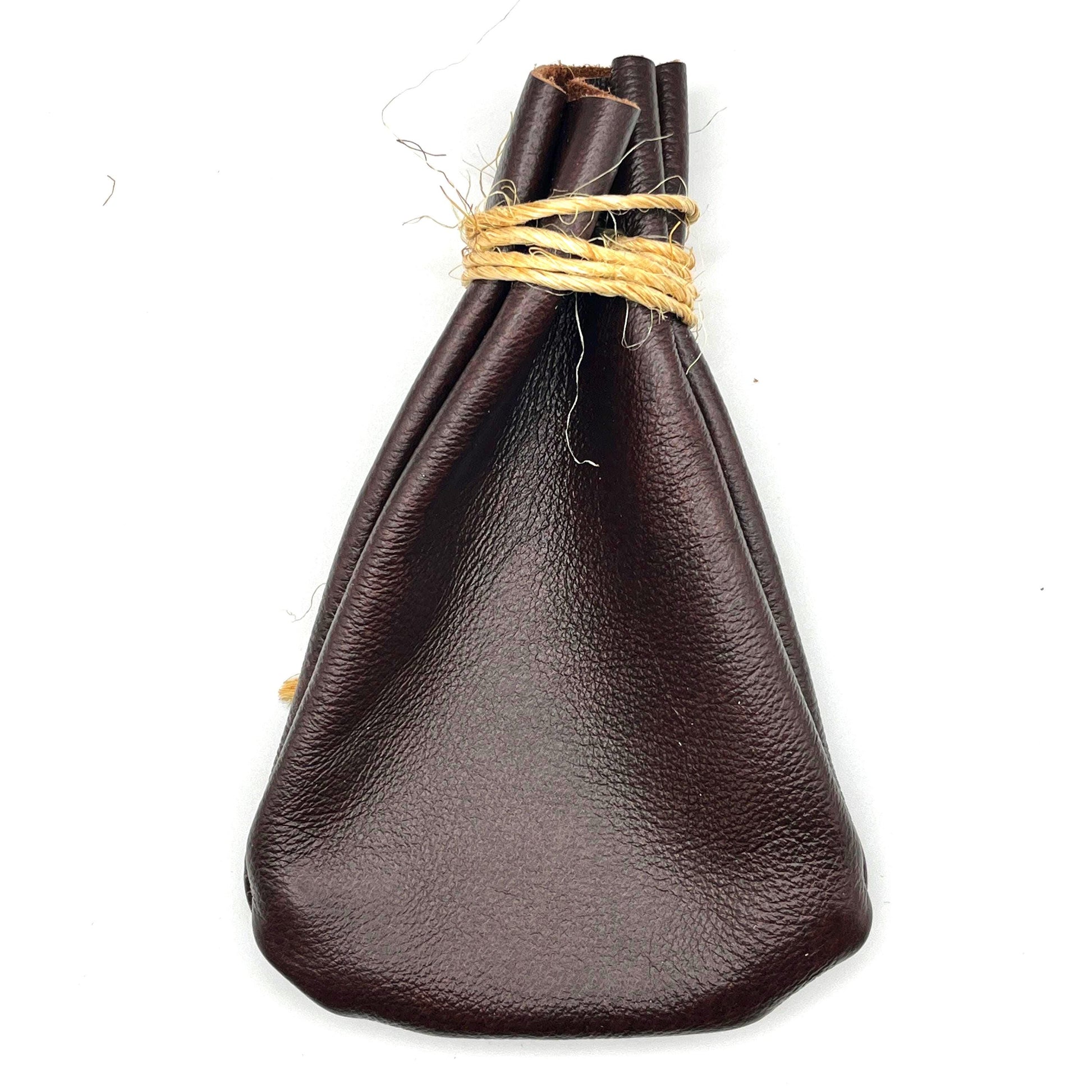 Handcrafted leather dice bag with drawstring, ideal for storing RPG dice sets. Perfect for DnD, tabletop games, or as a fantasy gift for gamers.