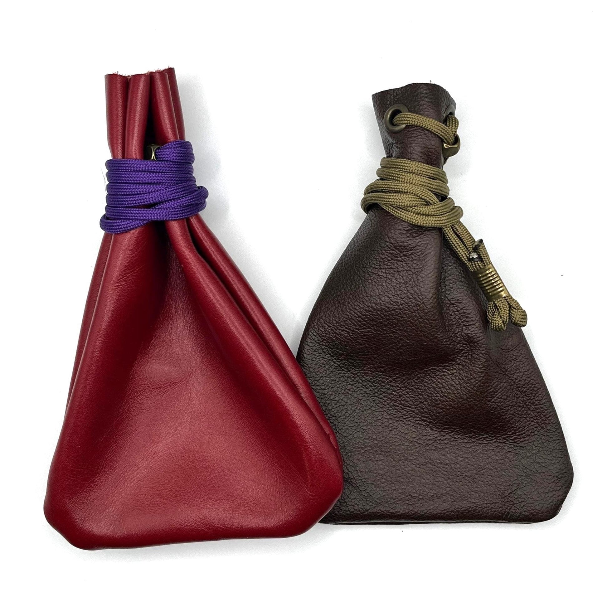 Handcrafted leather dice bag with drawstring, ideal for storing RPG dice sets. Perfect for DnD, tabletop games, or as a fantasy gift for gamers.