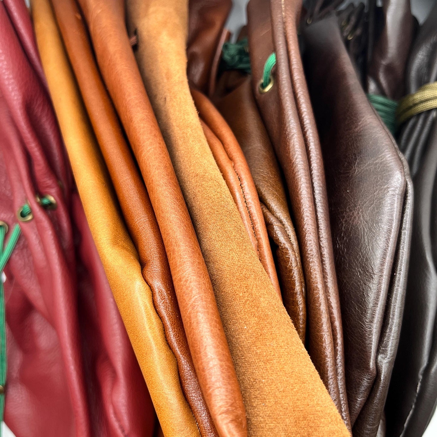 Handcrafted leather dice bag with drawstring, ideal for storing RPG dice sets. Perfect for DnD, tabletop games, or as a fantasy gift for gamers.