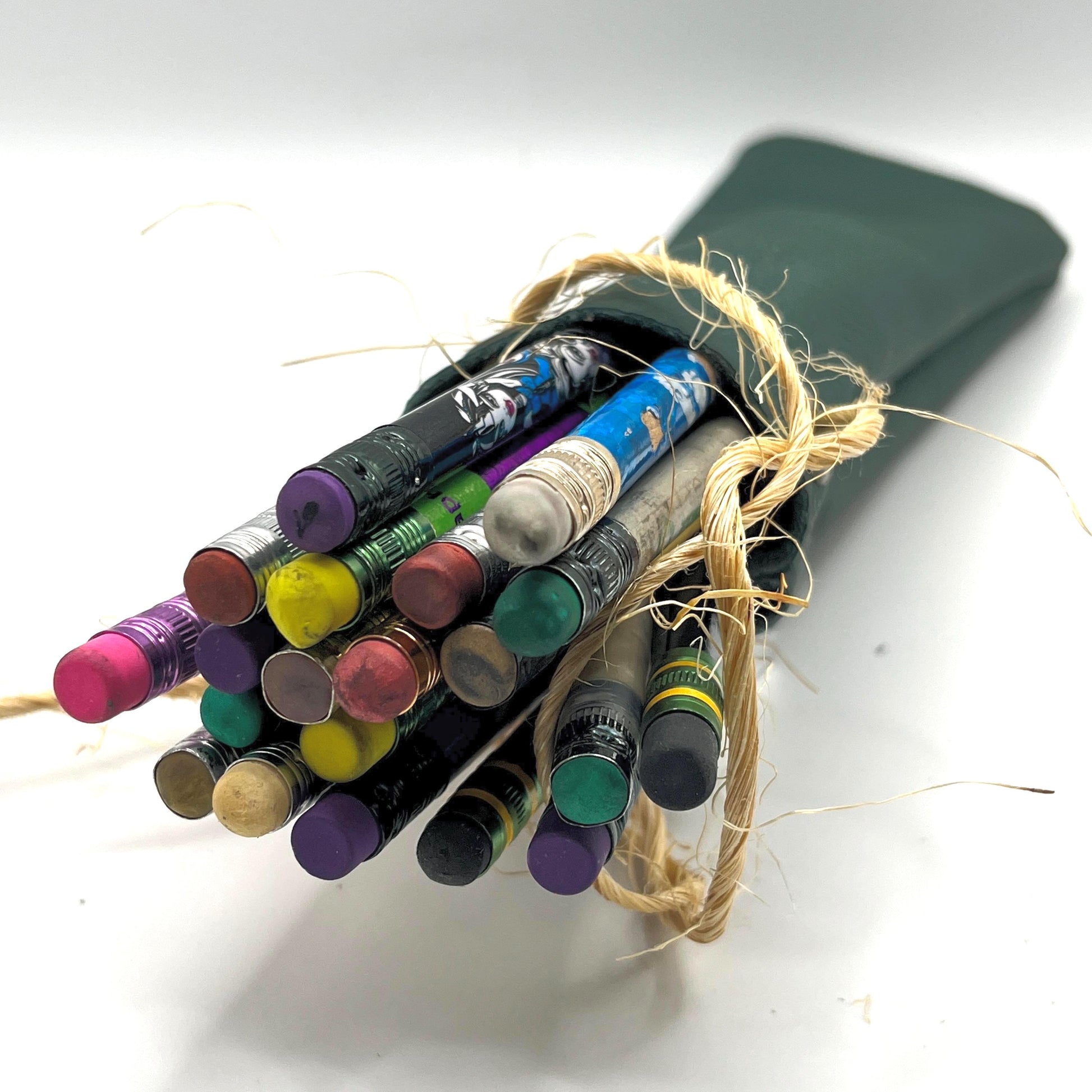 Handmade upcycled Italian leather pencil bag with drawstring, minimalist brown leather pen pouch for school, office, or travel, sustainable artisan stationery case.